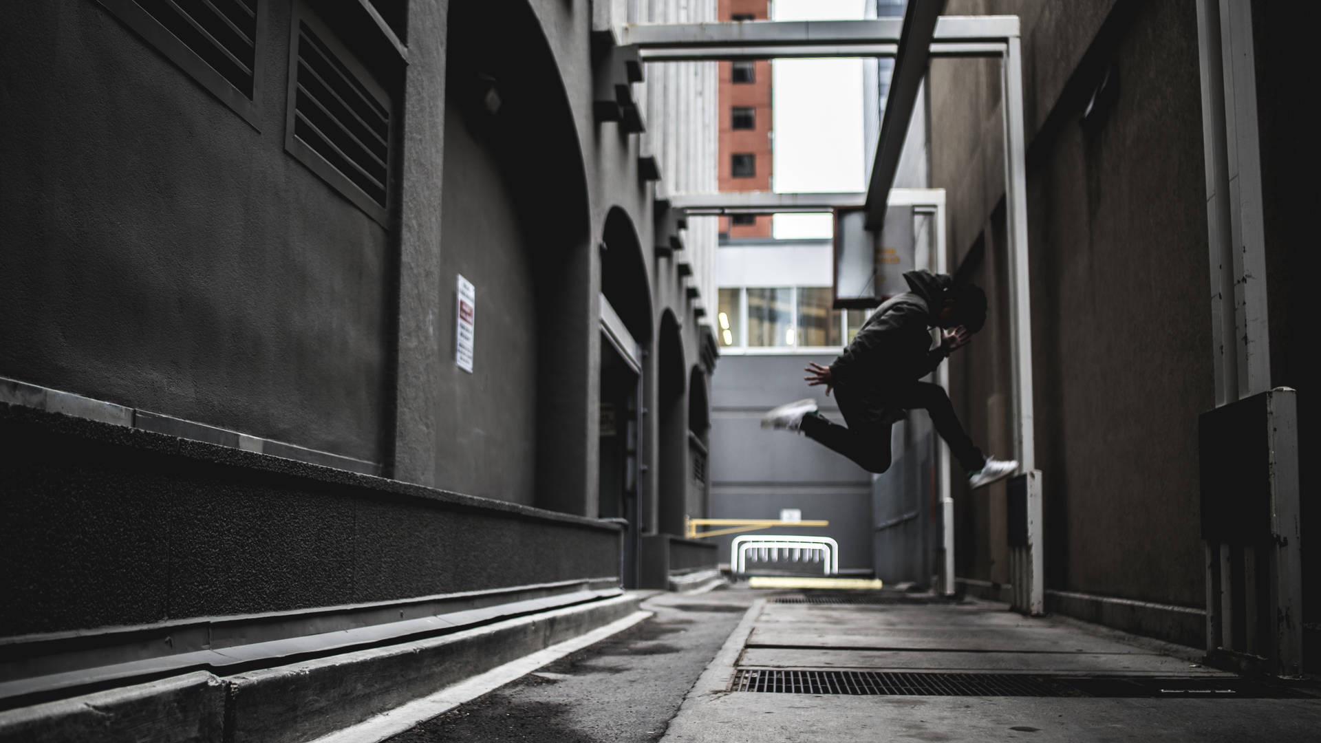 person wearing black pants and white shoes jumpshot