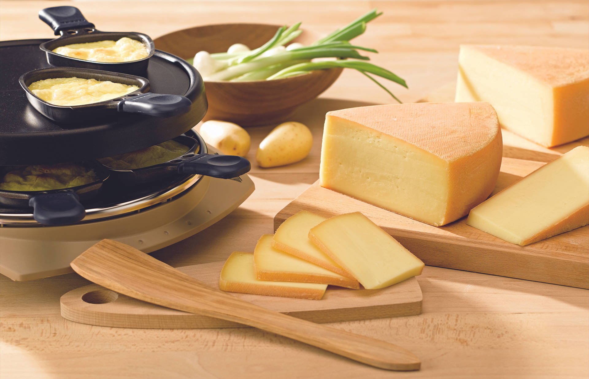 sliced cheese on brown wooden chopping board