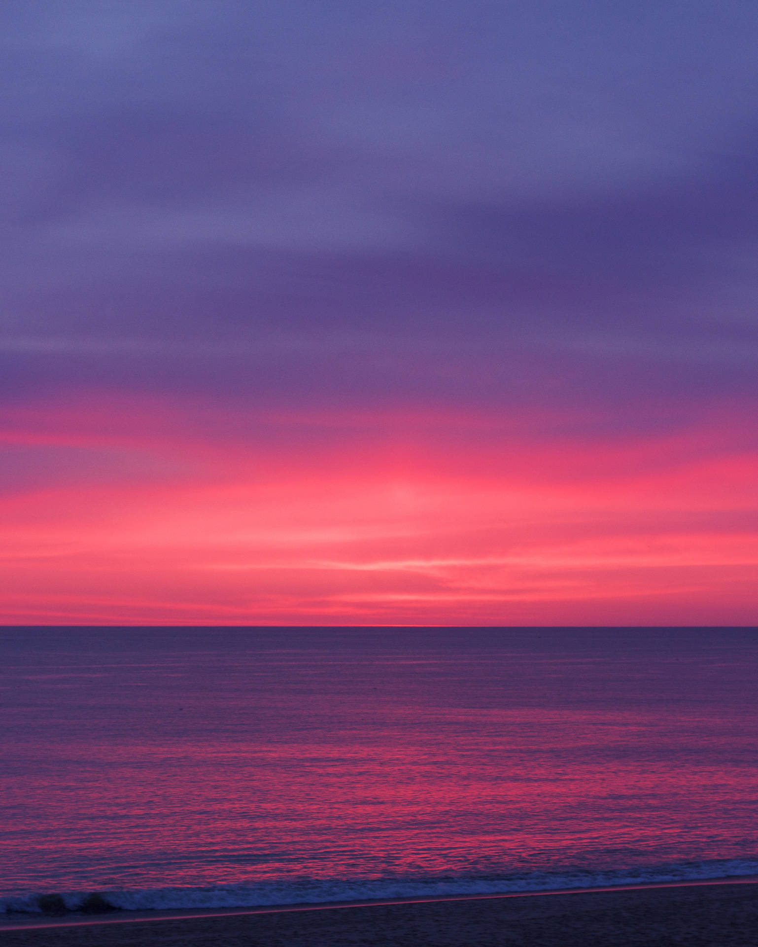 body of water during sunrise photo