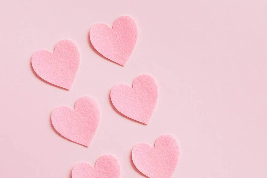 Free Heart Shaped Paper Cutouts On Pink Background Stock Photo
