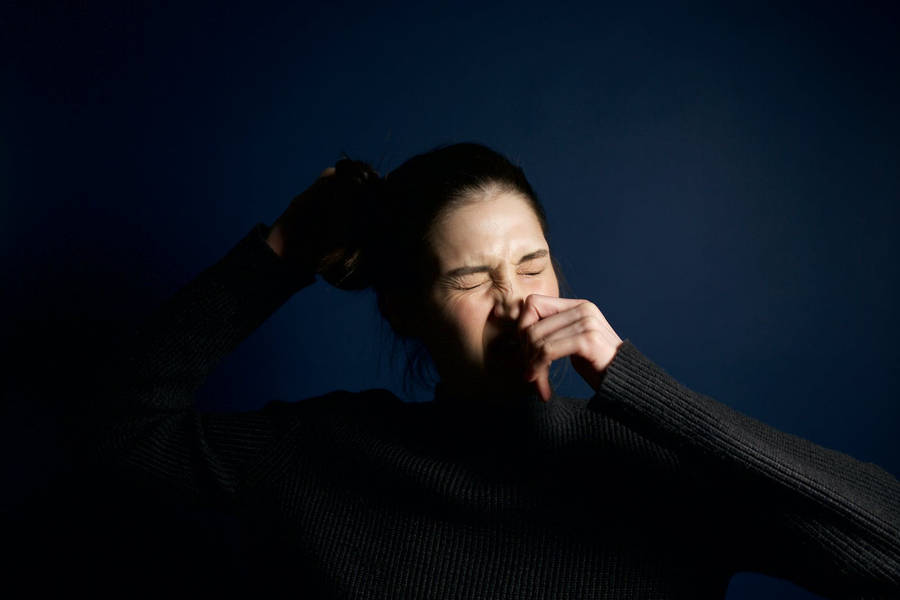 Free Woman Touching Her Nose Stock Photo