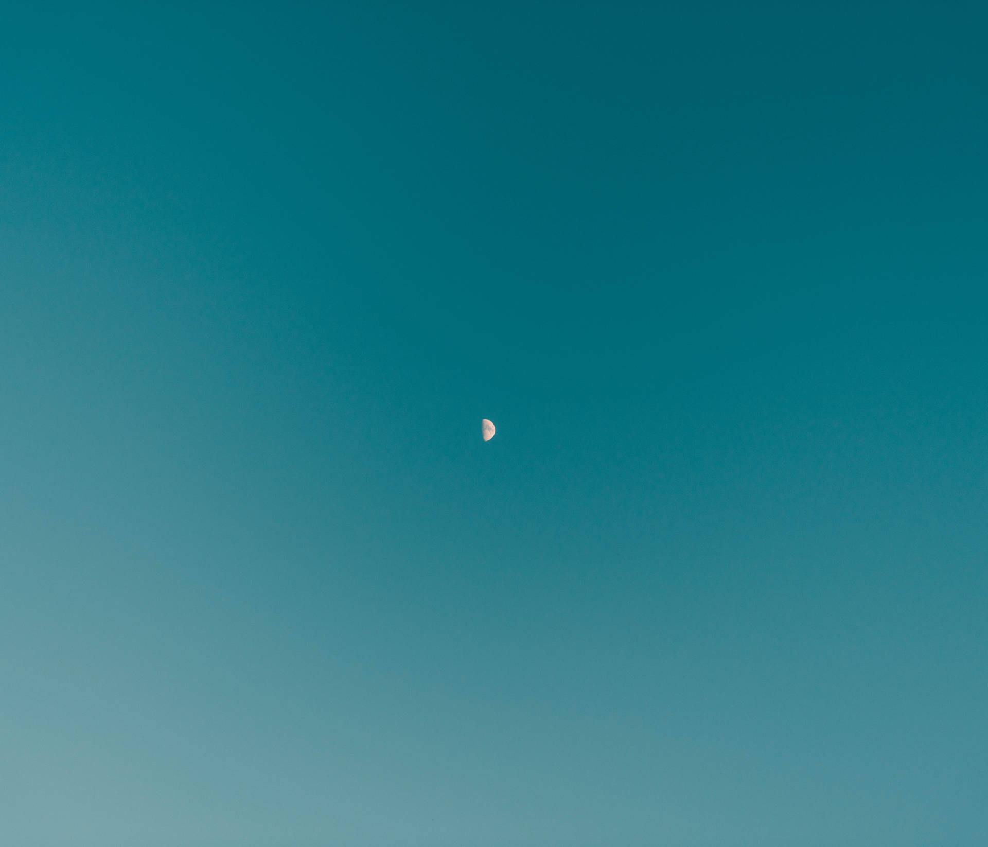 low-angle photography of half moon