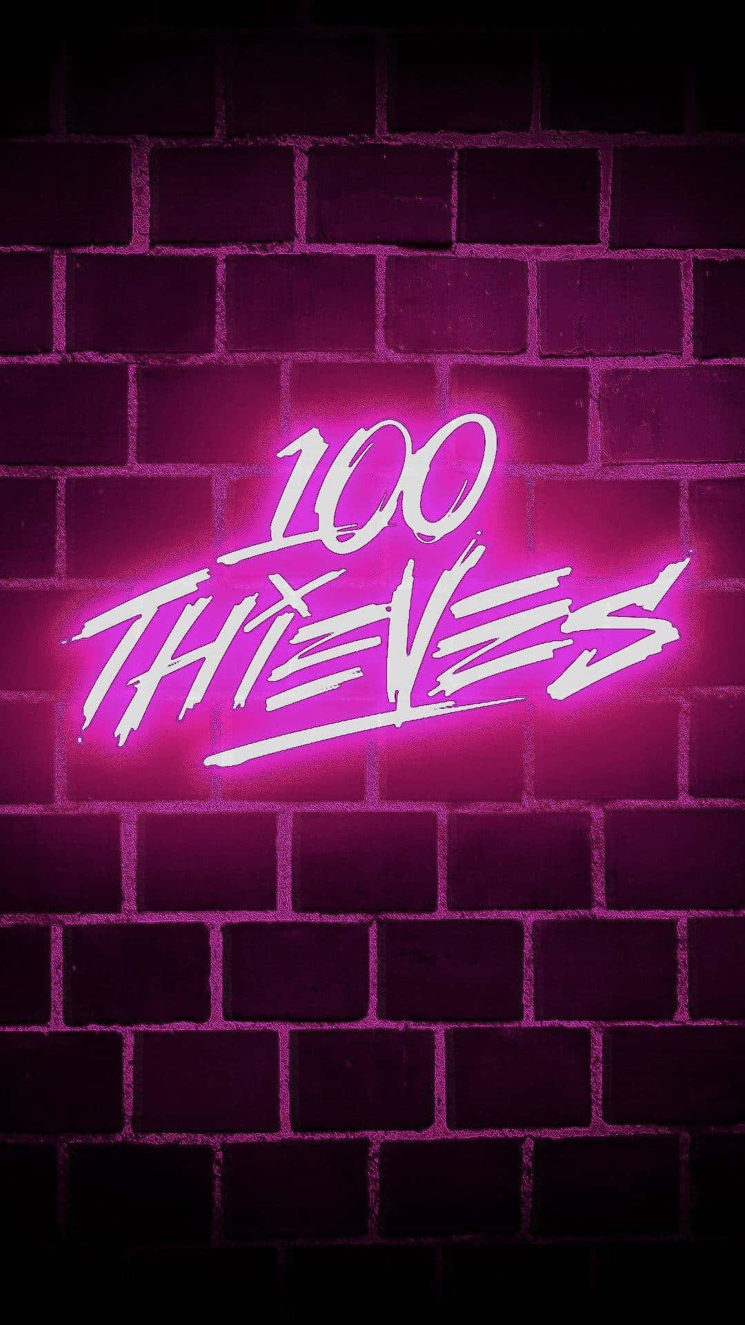 粉紅色霓虹燈牌寫著 100 THIEVES 在黑暗的磚牆上。