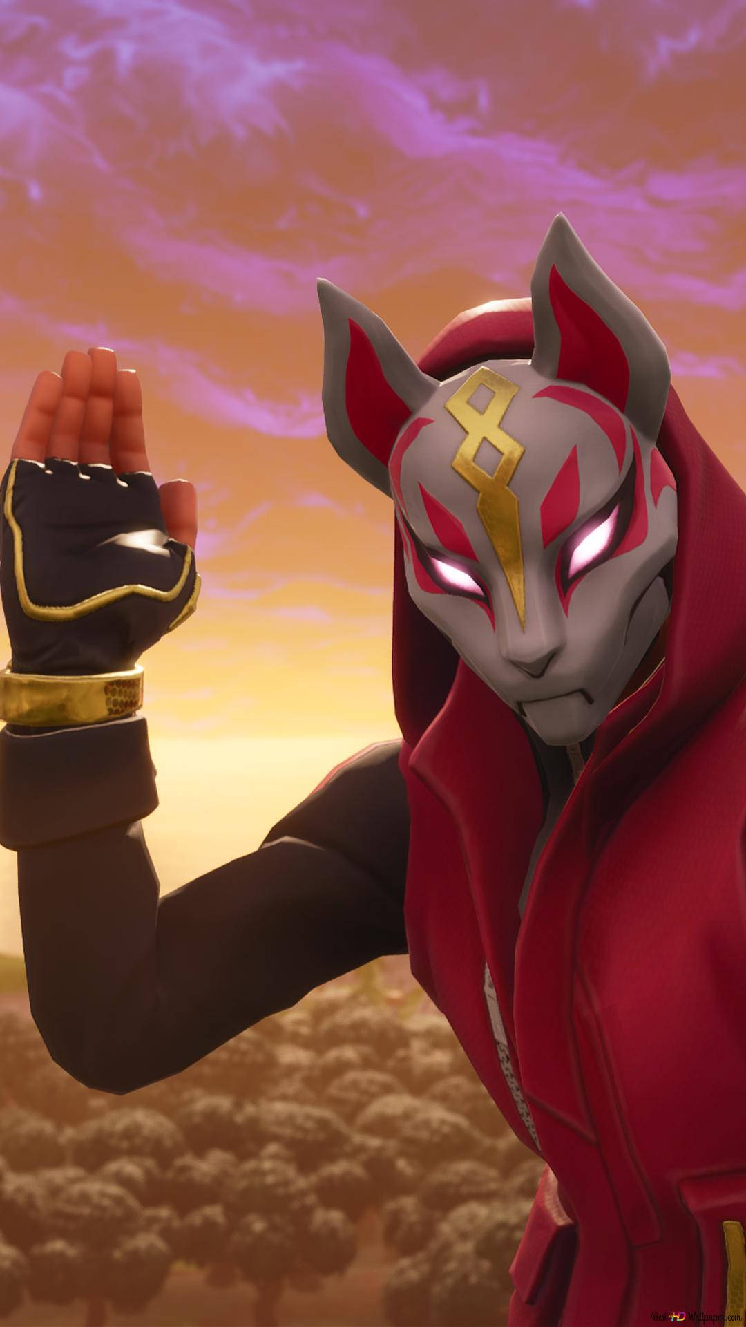 大逃殺從未如此精彩——1080p畫質的Fortnite 壁紙 — 一個戴面具、像狐狸的動漫角色，穿著紅色斗篷，在鮮豔的日落天空下舉起手。