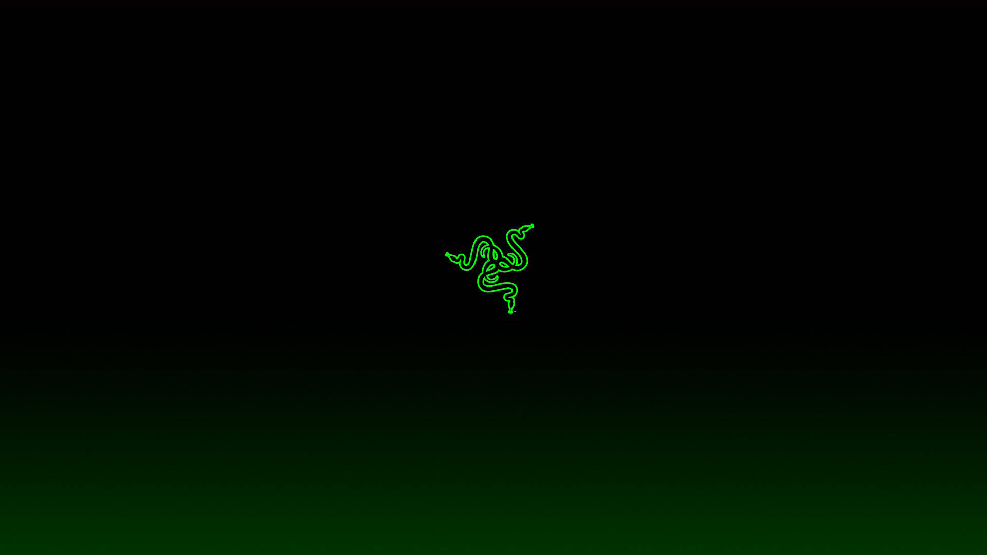 發光綠色Razer標誌在黑色到深綠色漸變背景上