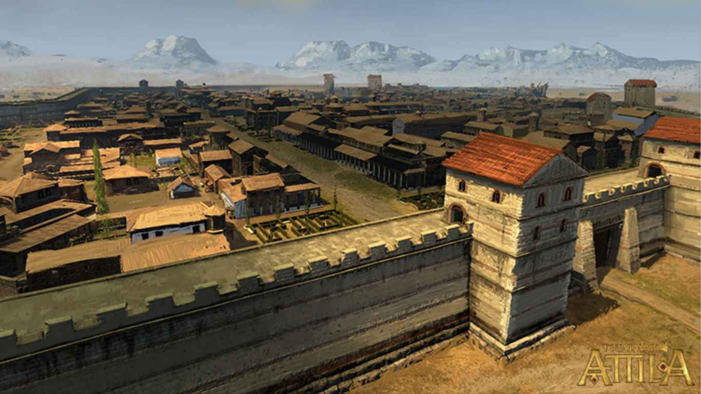 1366x768 Total War: Attila 背景 - 封閉城鎮 壁紙 — 一座廣闊的古城，擁有陶土屋頂和石塔，在晴朗的天空下以雪山為背景。