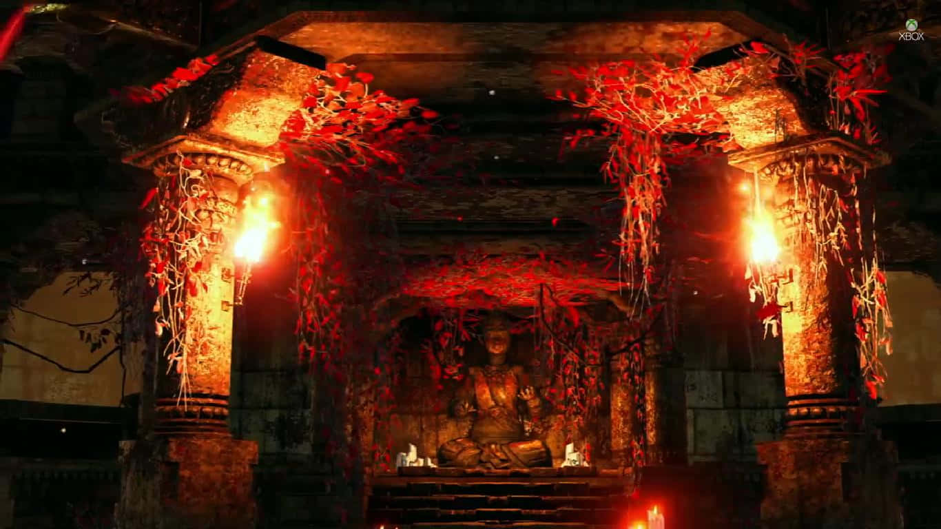 1366x768《孤島驚魂4》紅色佛教神殿背景 壁紙 — 一個黑暗的古老神殿，發光的紅色藤蔓和閃爍的火炬照亮了神秘廢墟中的一座坐像。
