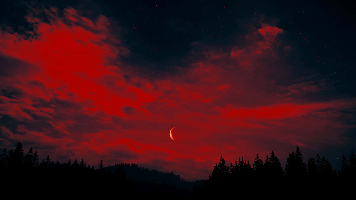1366x768《孤島驚魂4》背景：血紅天空 壁紙 — 一彎新月在暗黑森林剪影上方、帶有雲紋的火紅天空中發出蒼白光芒。