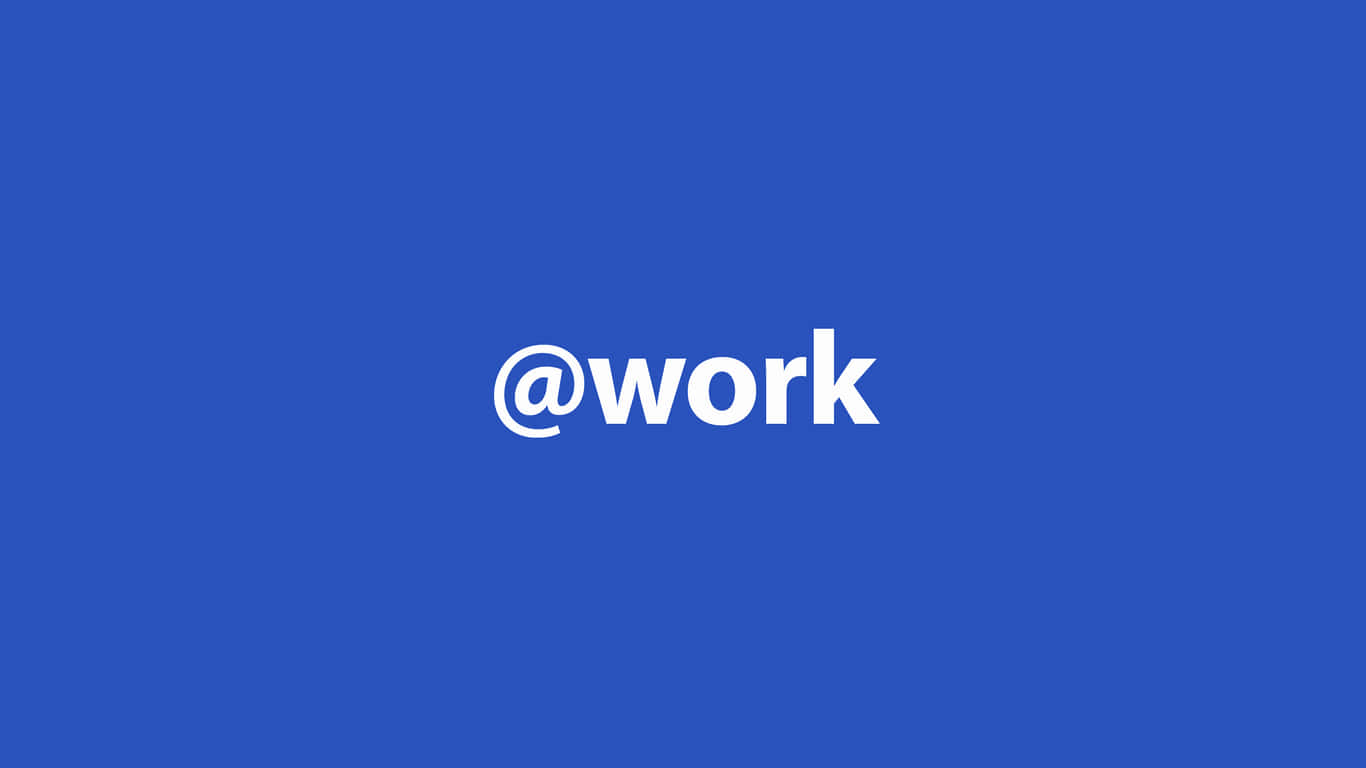 藍色背景上居中白色 @work 文字。