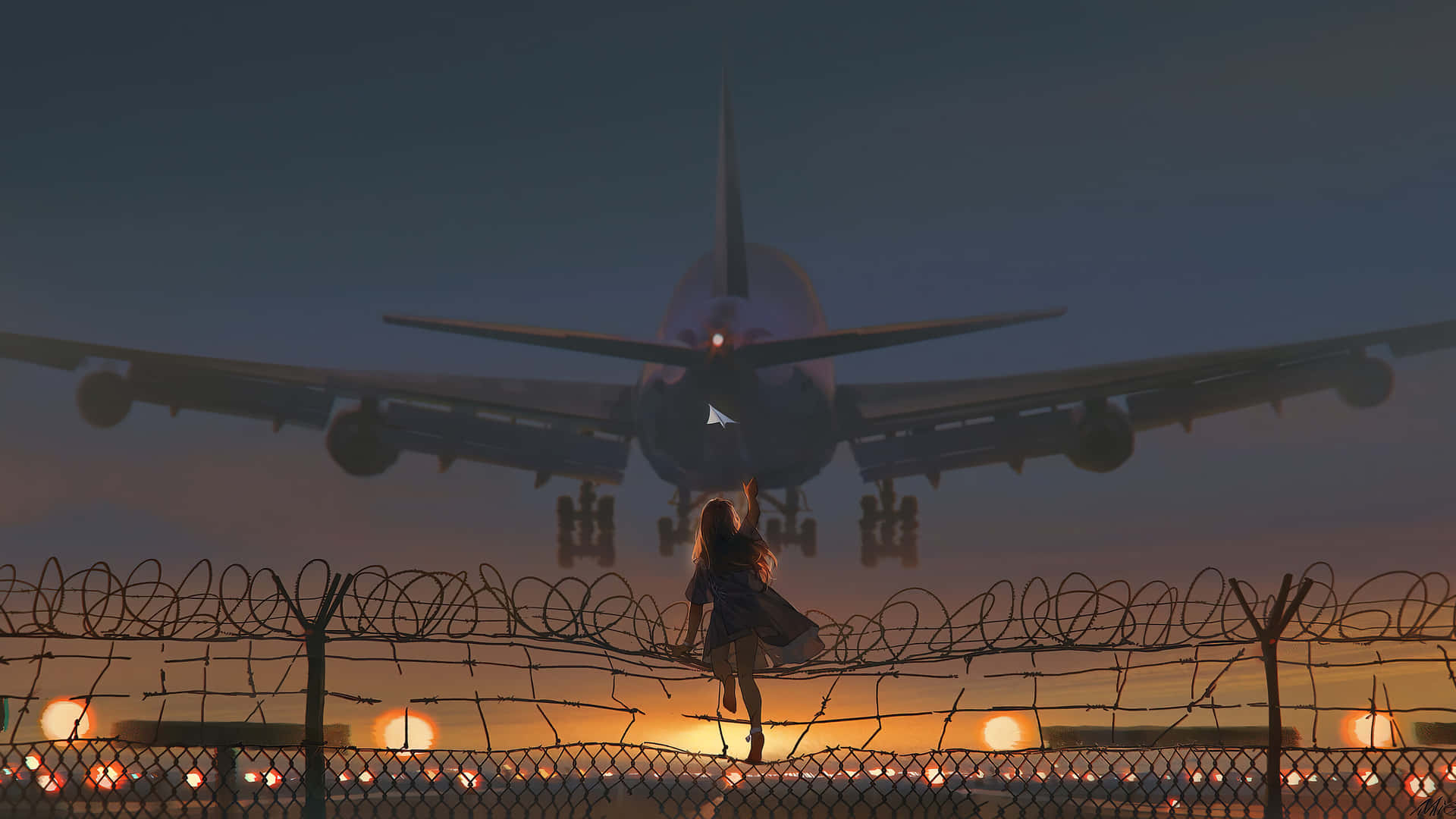 日落時分，人隔著圍欄看飛機降落
