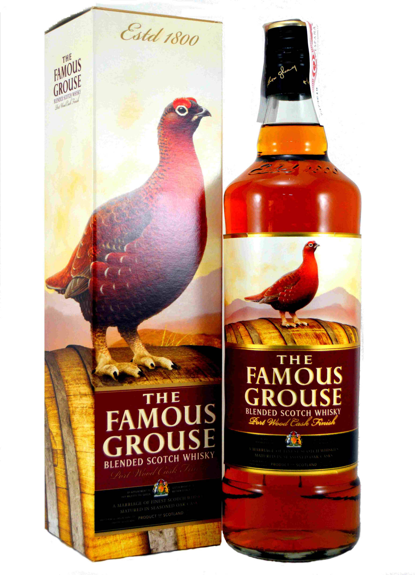 Famous Grouse威士忌瓶和盒，桶標上有紅色松雞。