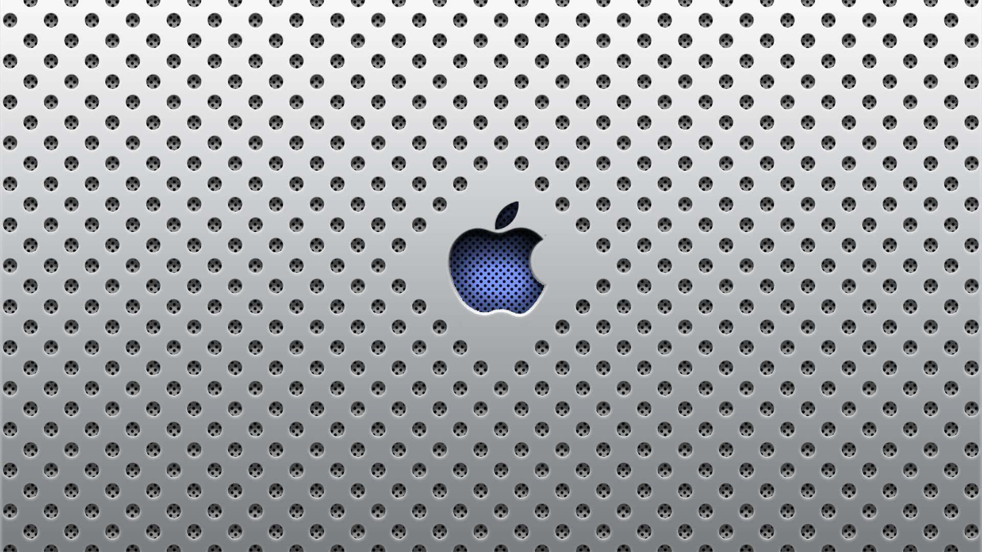 帶有藍色穿孔Apple標誌的銀色筆記本電腦蓋
