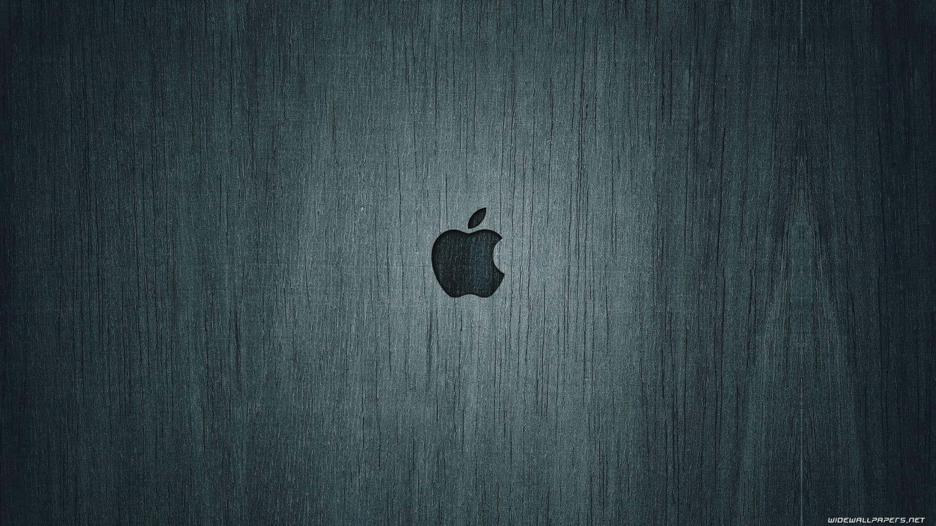 Apple標誌在拉絲金屬背景上