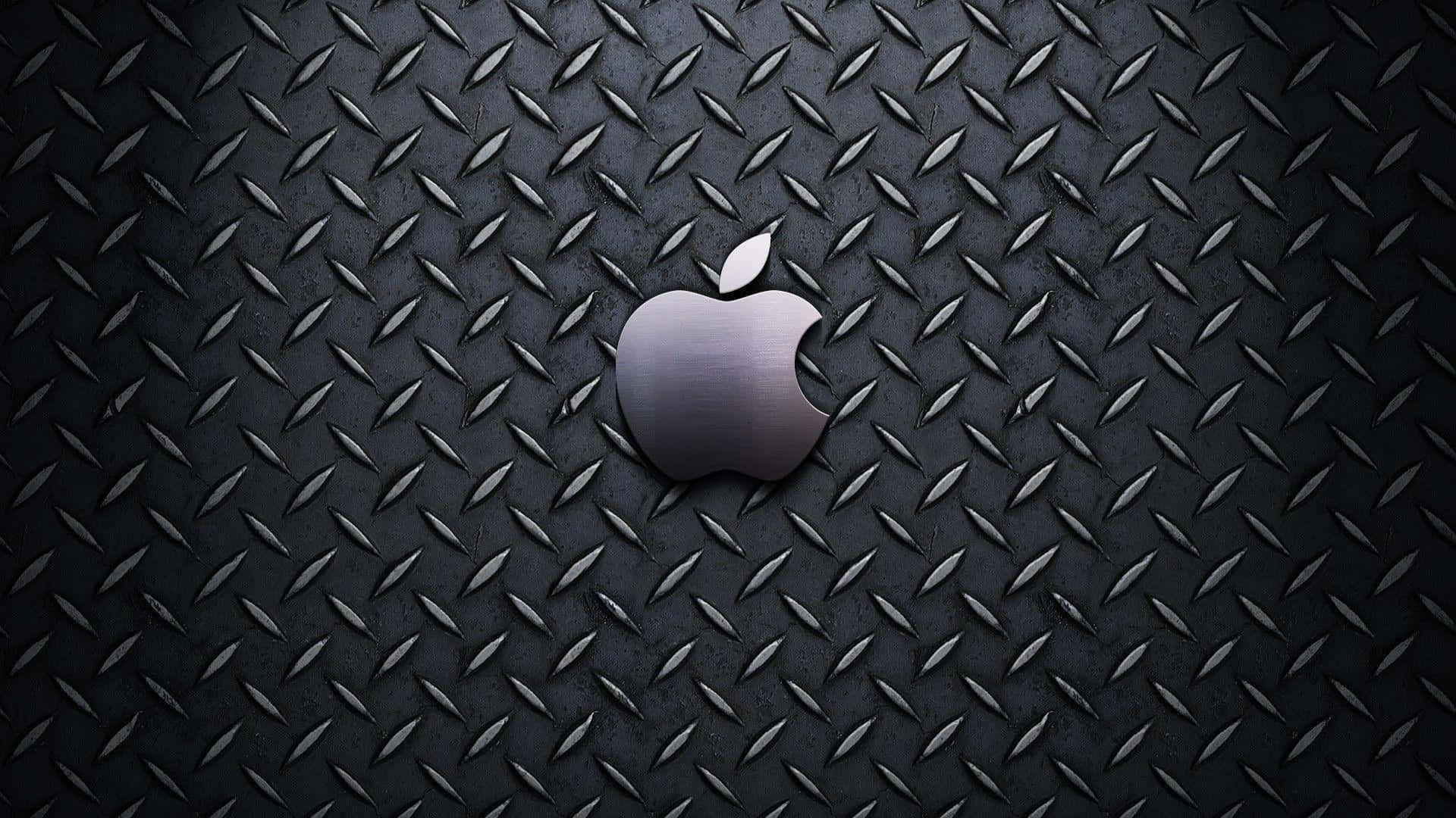 深色菱形金屬板背景上的Apple標誌
