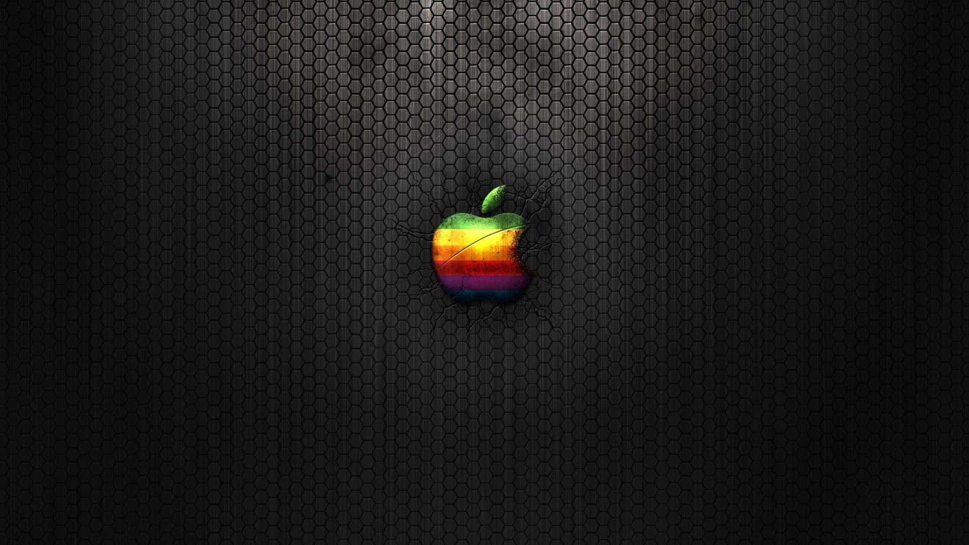 深色六角網格背景上的復古彩虹Apple標誌。