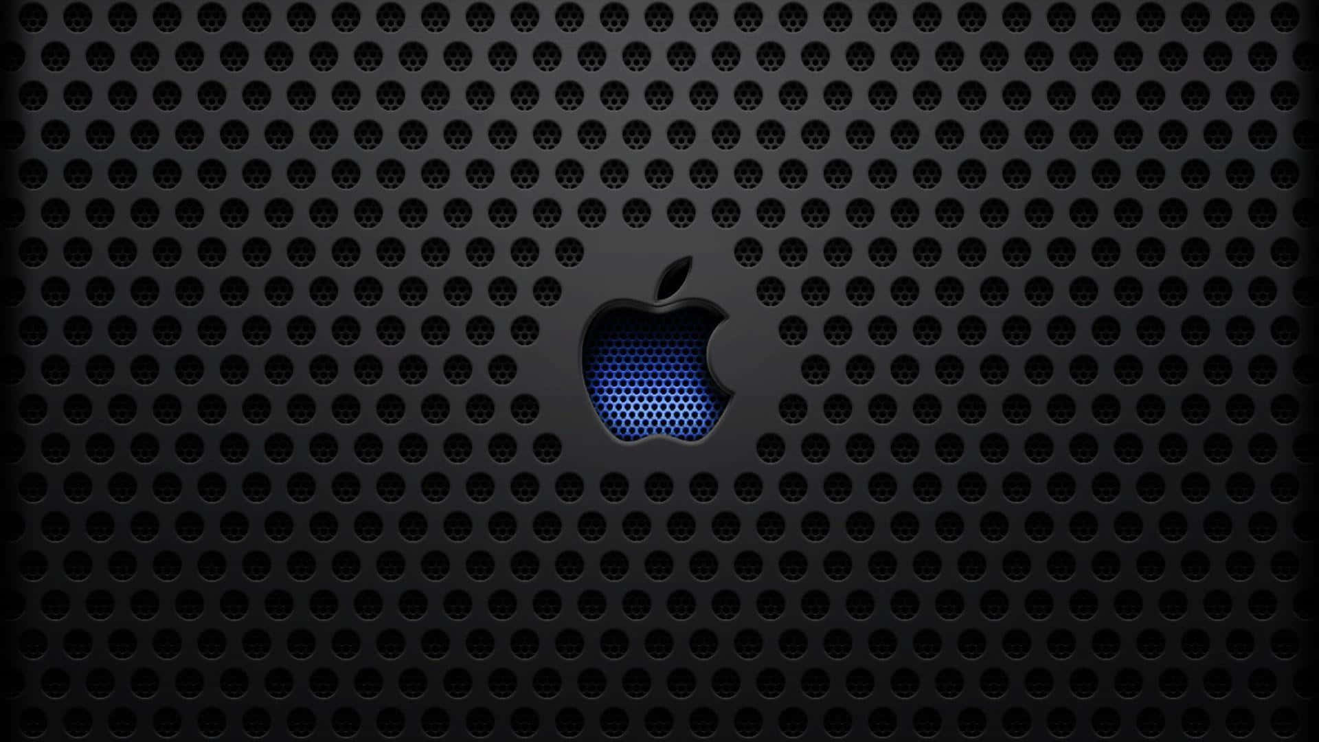 帶有發光藍色Apple標誌的黑色穿孔表面。