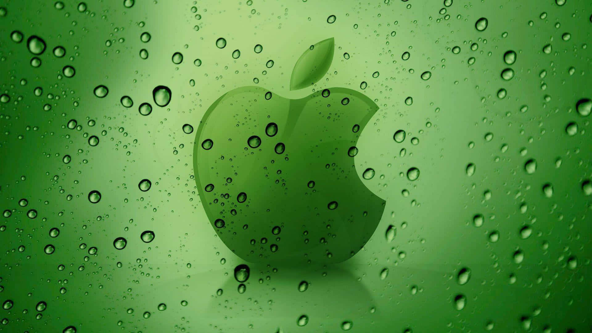 透過玻璃上的雨滴看到的綠色Apple標誌。