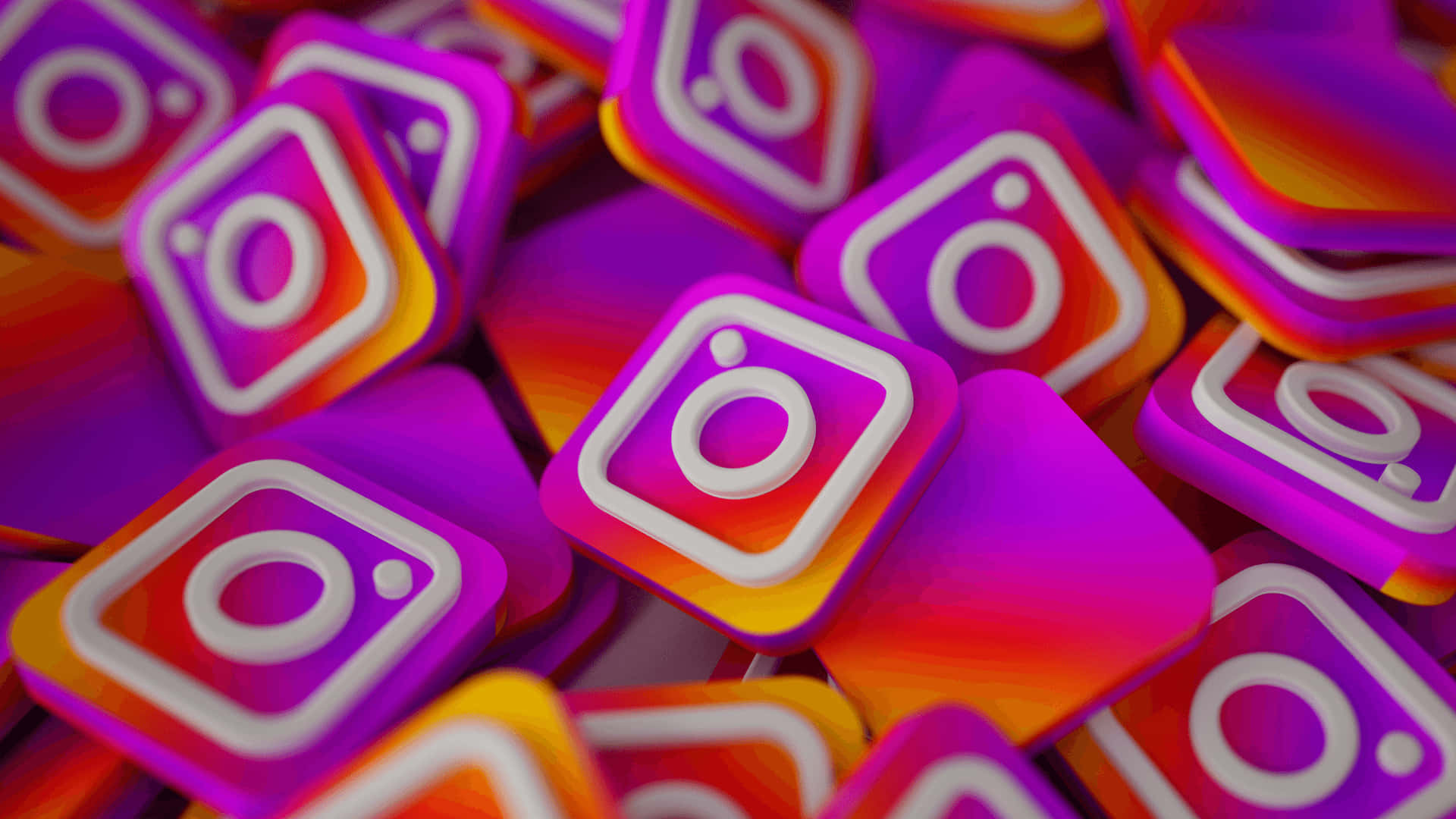 1920x1080 社交媒體背景 Instagram 3D 標誌 壁紙 — 一堆色彩鮮豔的 3D 渲染 Instagram 應用程式圖標，帶有紫色、橙色和白色的漸變色。