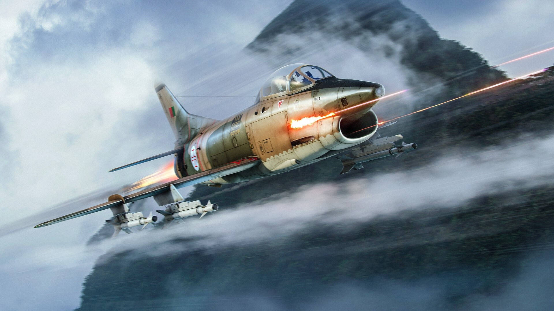 1920x1080 菲亞特 G.91 擊機 壁紙 — 一架戰鬥機穿過暴風雲，在崎嶇的山脈上空發射導彈，留下熾熱的尾跡。