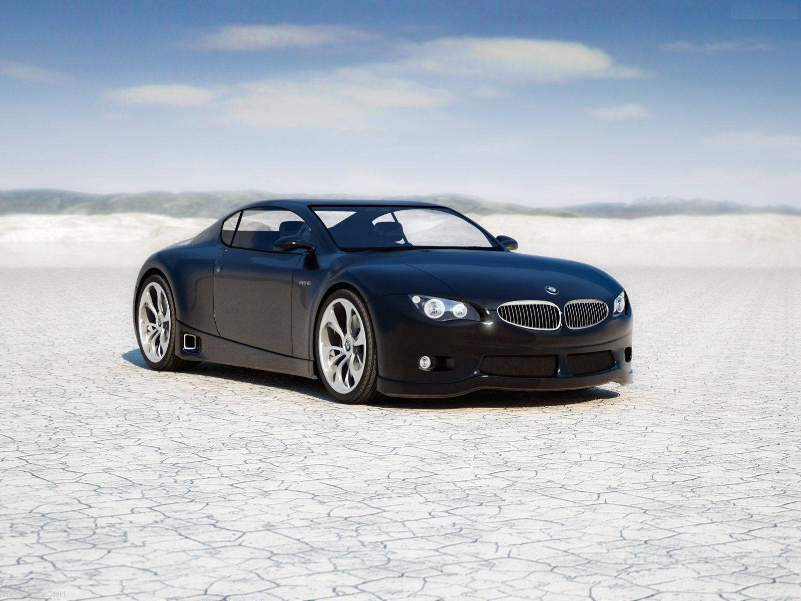 2008 BMW M系列跑車 壁紙 — 一架時尚的黑色BMW跑車停泊在龜裂的白色沙漠地面上，頭頂是清澈的藍天。