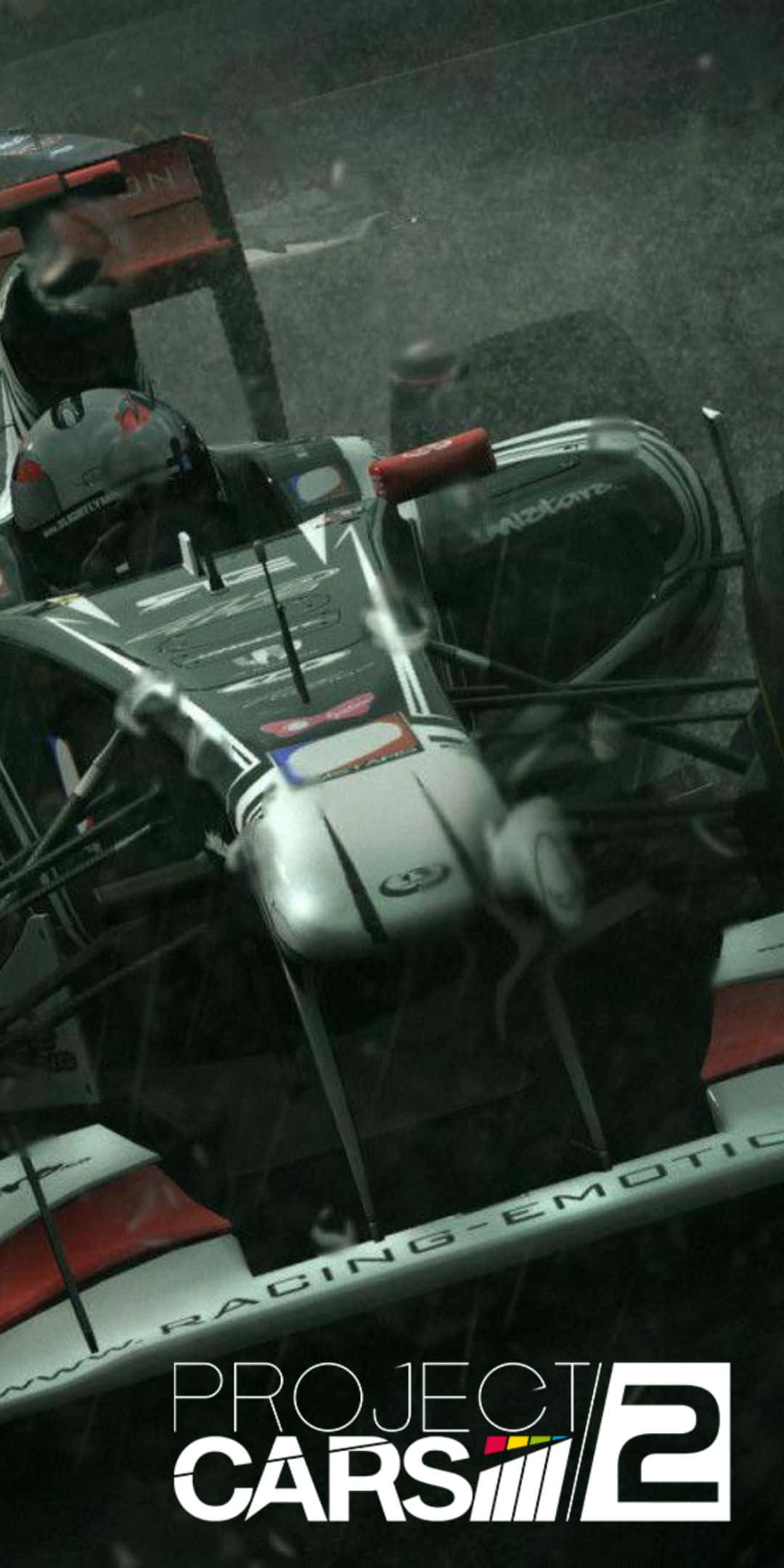 2011年法拉利A型賽車《Pixel 3 Project Cars 2》背景 壁紙 — 一輛賽車在濕滑的賽道上飛馳，可見車手頭盔，底部有遊戲標誌。
