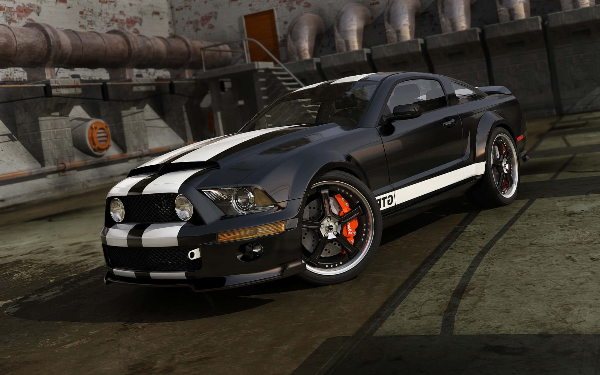 2015 年福特野馬運動車 壁紙 — 一輛黑色Shelby GT500，帶有白色賽車條紋和橙色制動卡鉗，停在工業倉庫環境中。