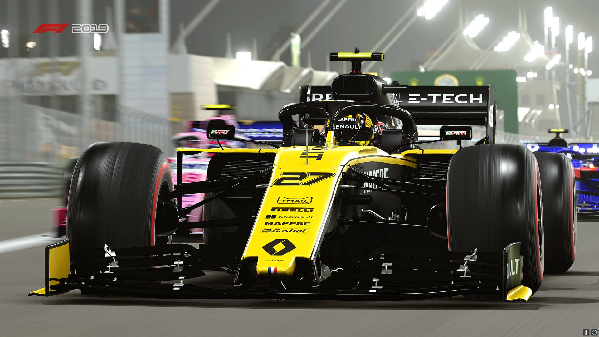 黃黑相間的雷諾F1賽車在賽道上的照明隧道中奔馳。
