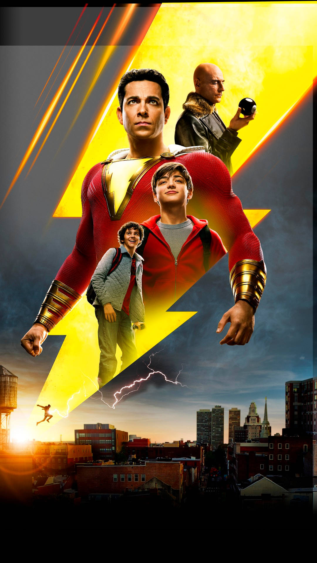 Shazam! 電影海報，四個角色在日落時分的城市上空。