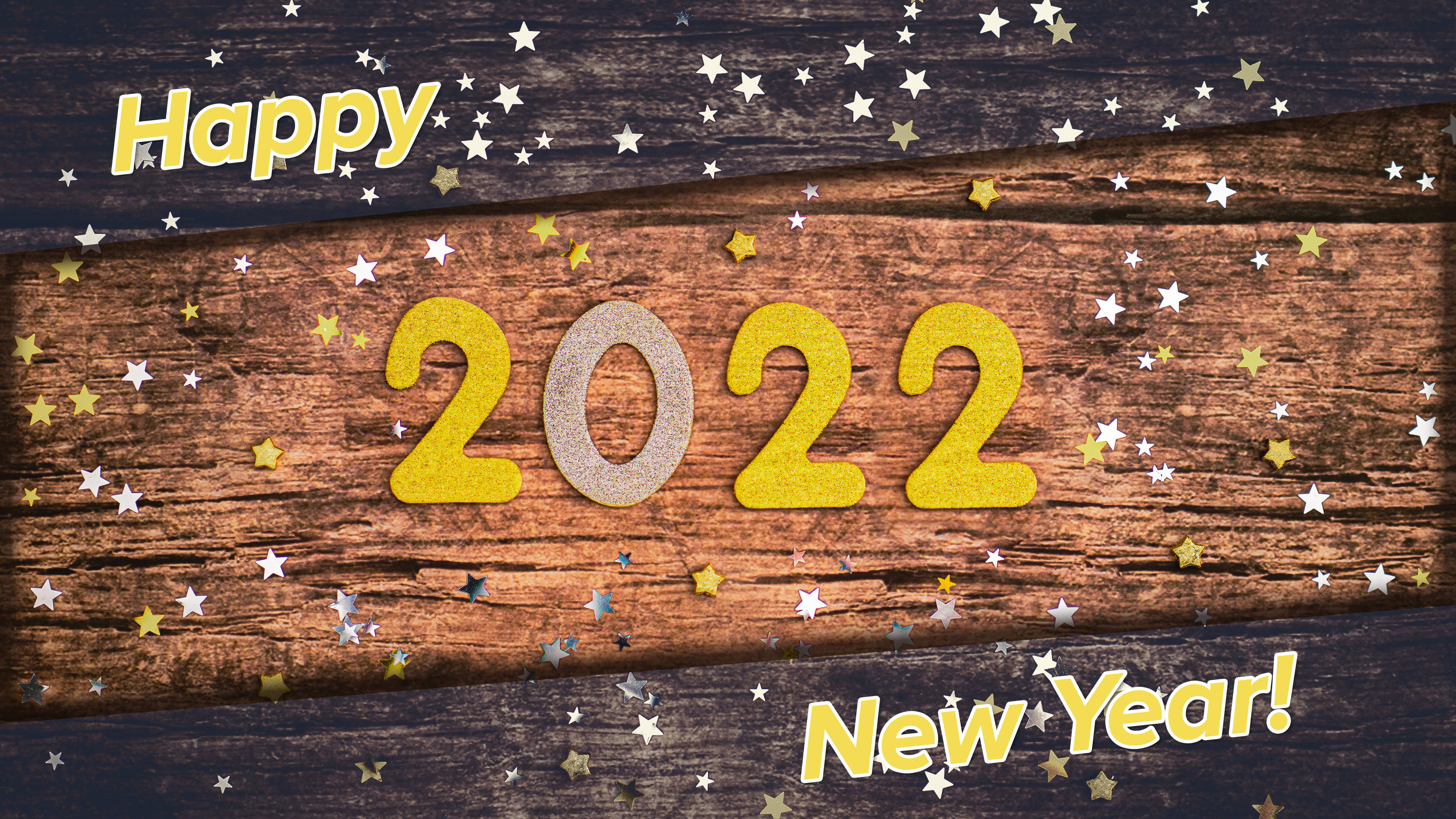 以希望與喜悅迎接2022新年 壁紙 — 金色閃亮的2022文字和星星在質樸的木板上慶祝新年。