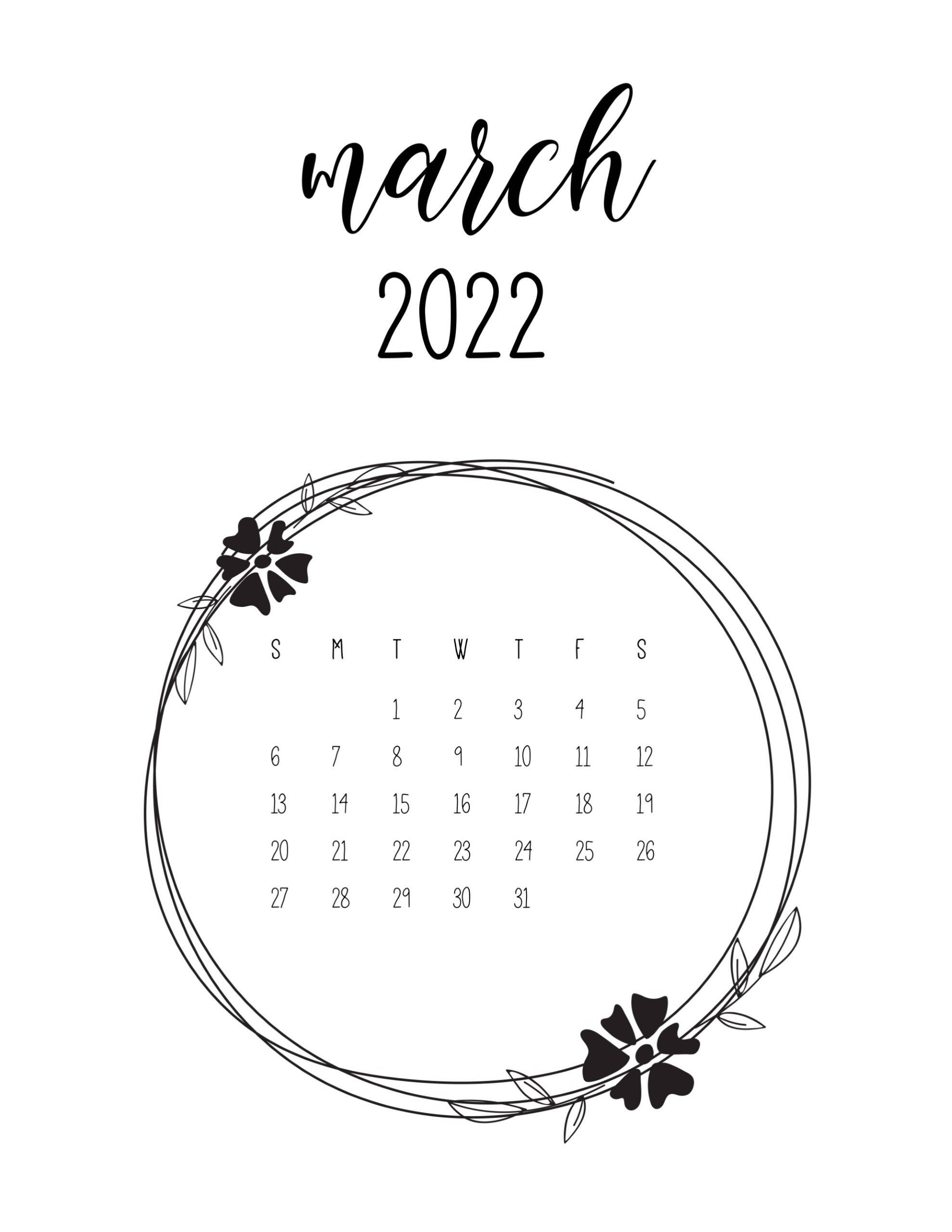 2022年三月簡約春季 壁紙 — 簡約黑白2022年3月日曆，以精緻花環框住，花環上有兩朵花。