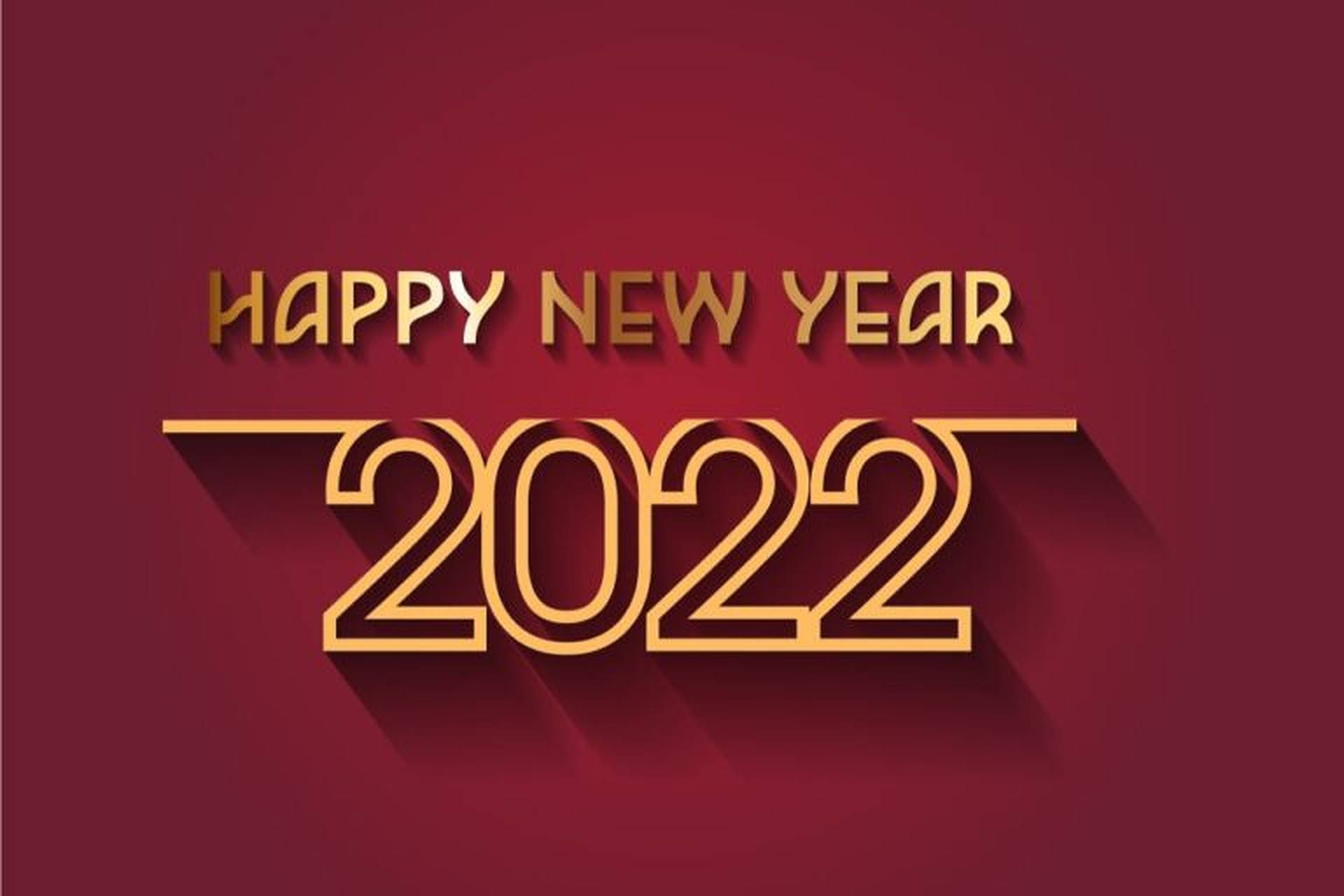 2022 新年紅金 壁紙 — 大膽的金色「Happy New Year 2022」文字在濃郁的酒紅色背景上投下長長的陰影。