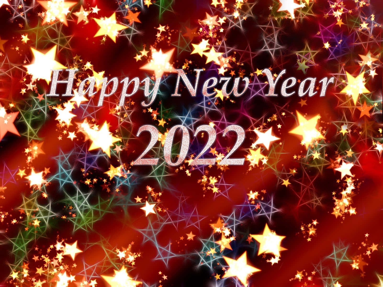 Happy New Year 2022 賀卡，在紅色背景上帶有閃爍星星和閃亮粒子。
