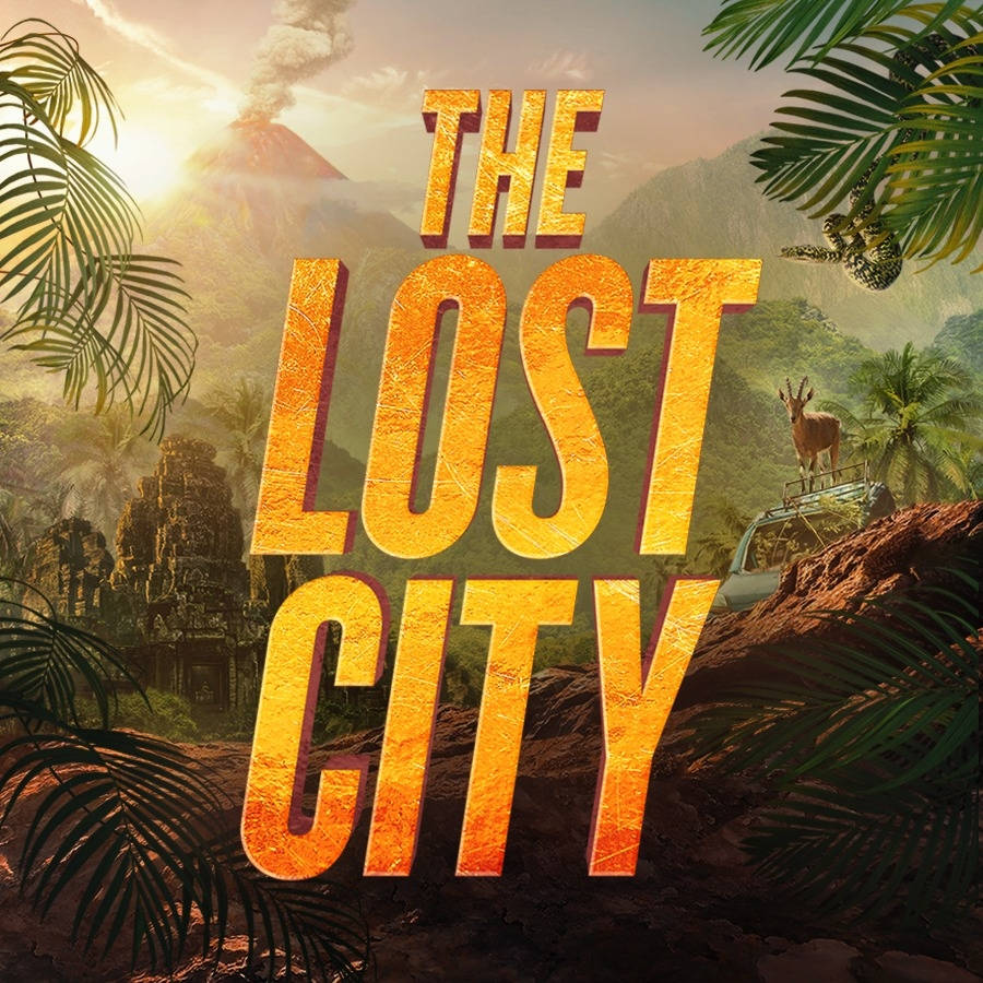 金色文字顯示「The Lost City」，背景為叢林，有冒煙的火山和一隻鹿在車上。