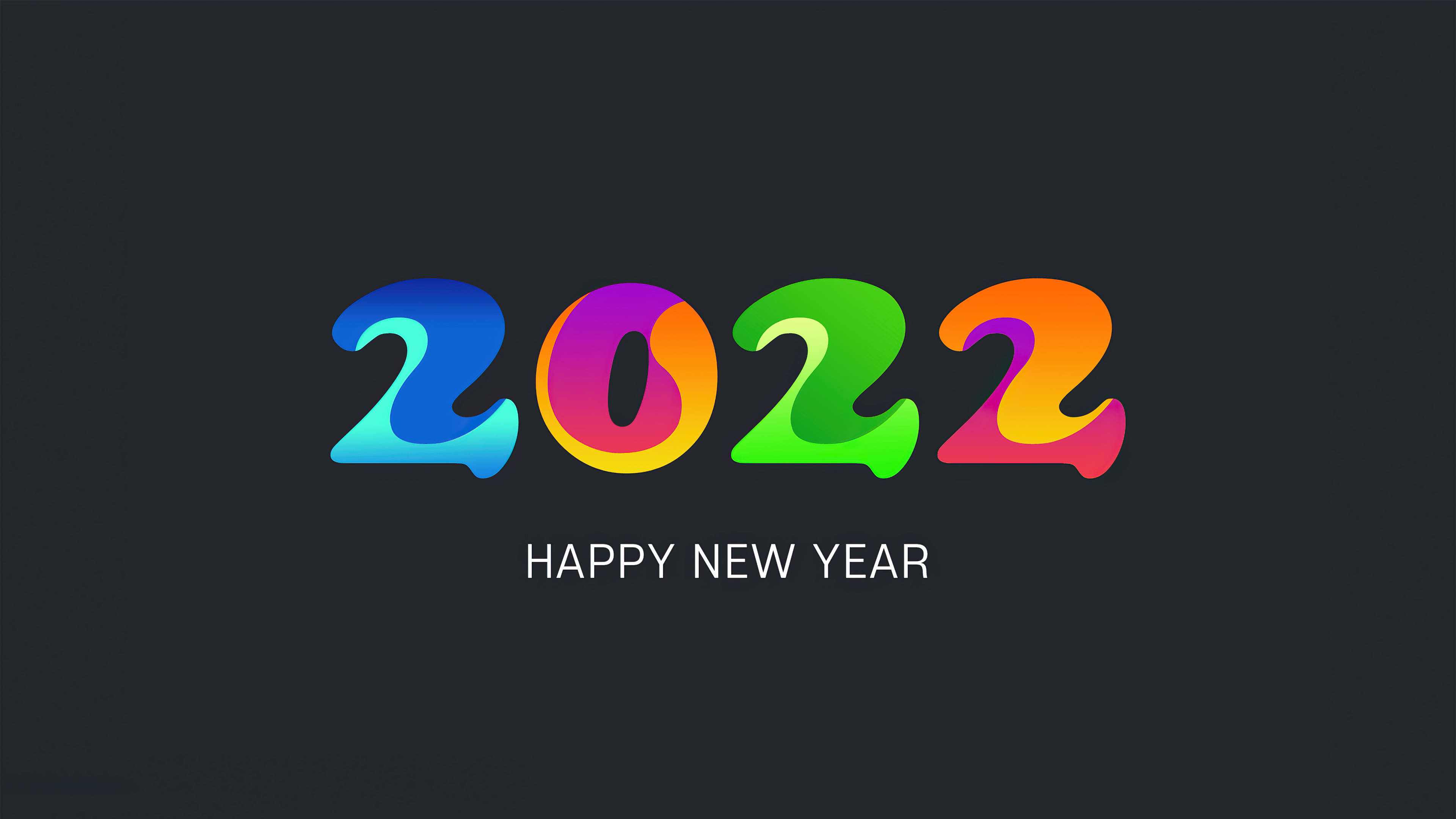 2022新年彩色霓虹藝術 壁紙 — 鮮豔彩虹漸變2022文字，下方有「HAPPY NEW YEAR」在深色背景上。