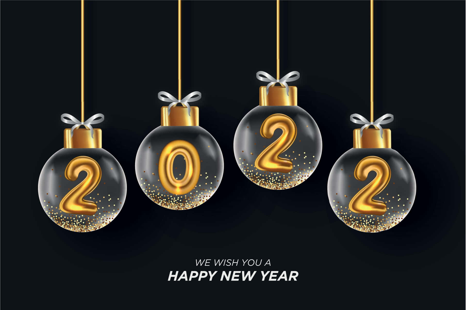 四個帶有金色2022文字和閃粉的懸掛黑色裝飾品，用於新年慶祝。