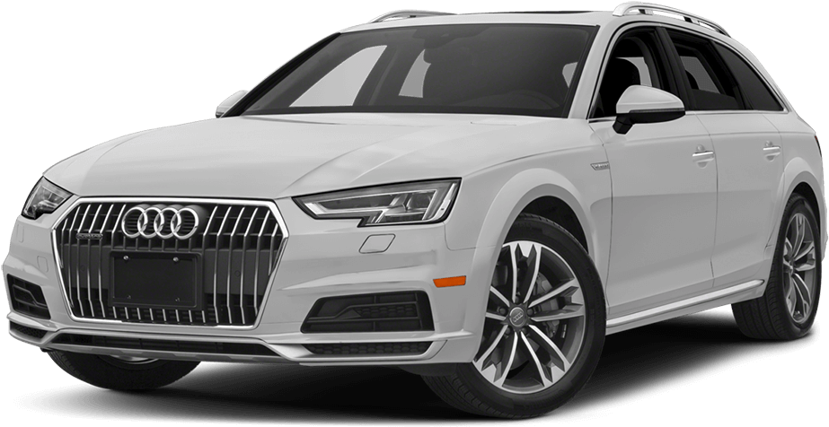 2023款白色奧迪Q5 SUV 壁紙 — 一輛時尚的白色奧迪旅行車，帶有鍍鉻飾邊和合金輪圈，在黑色背景的影樓燈光下展示。