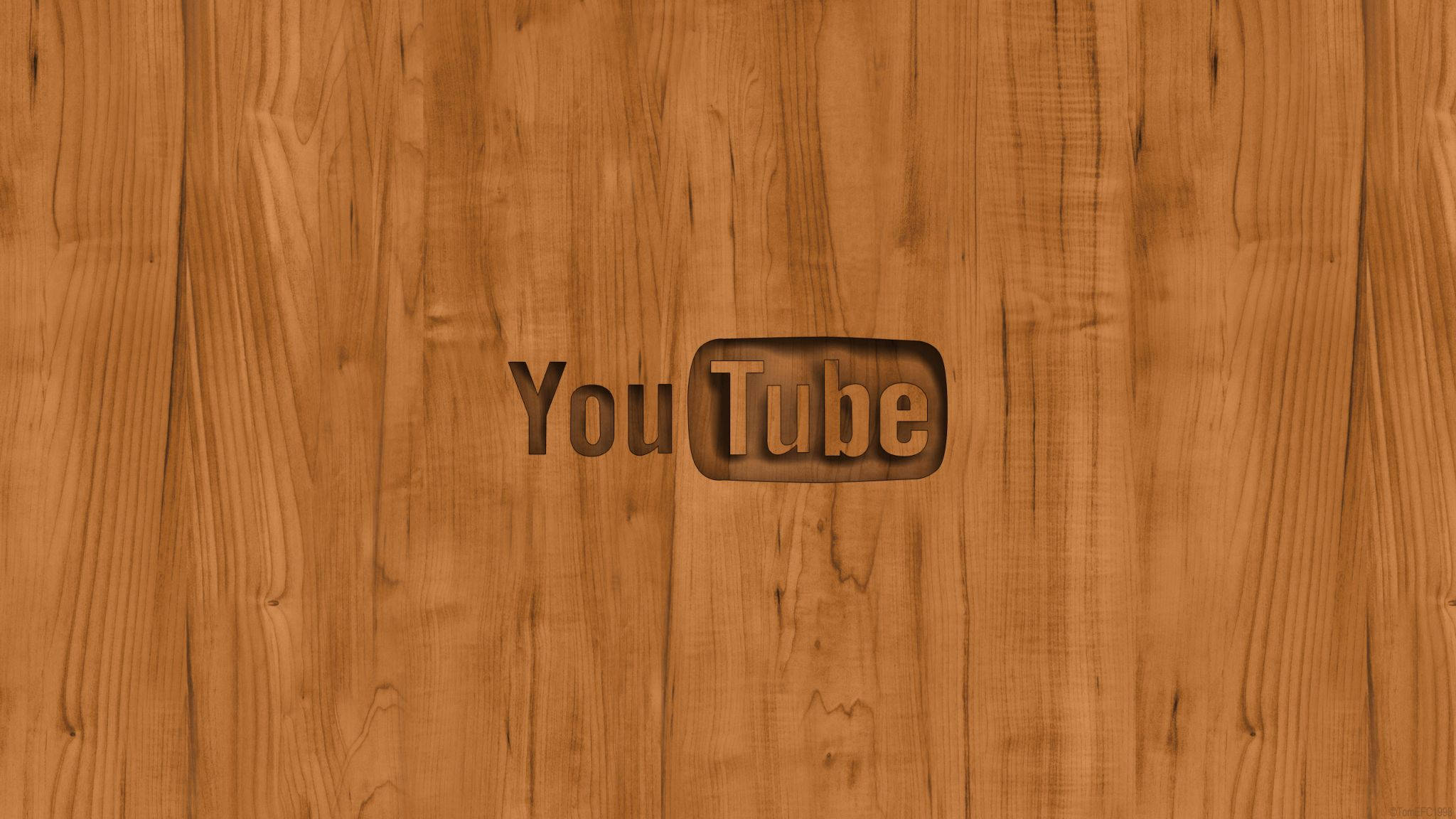 木質 2048x1152 YouTube 標誌 壁紙 — YouTube 標誌雕刻在溫暖的木板上，帶有天然木紋紋理。