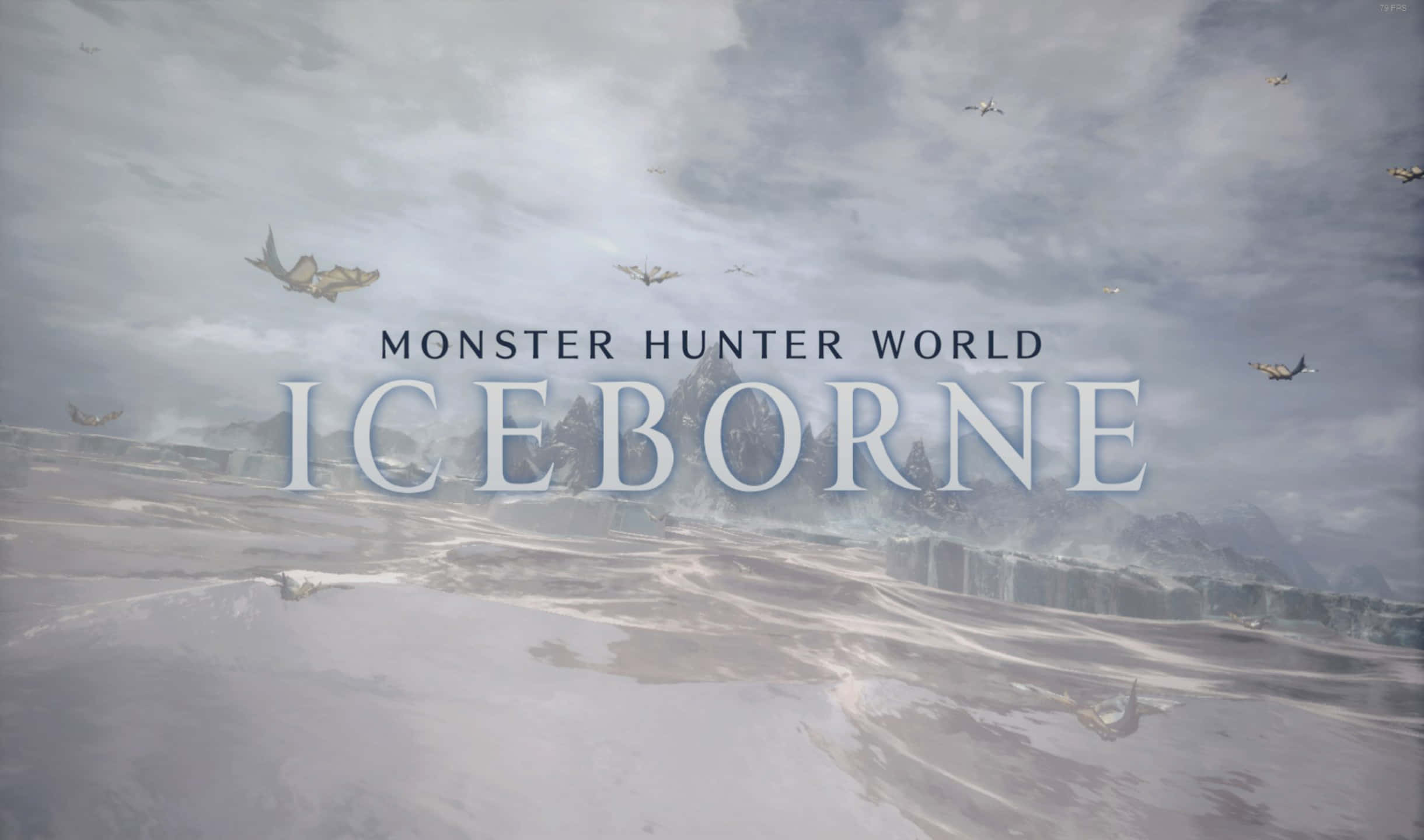 2440x1440 Monster Hunter World 冰霜背景 壁紙 — 廣闊雪景，冰封山脈與飛行生物在陰雲天空下，標題為Monster Hunter World Iceborne。