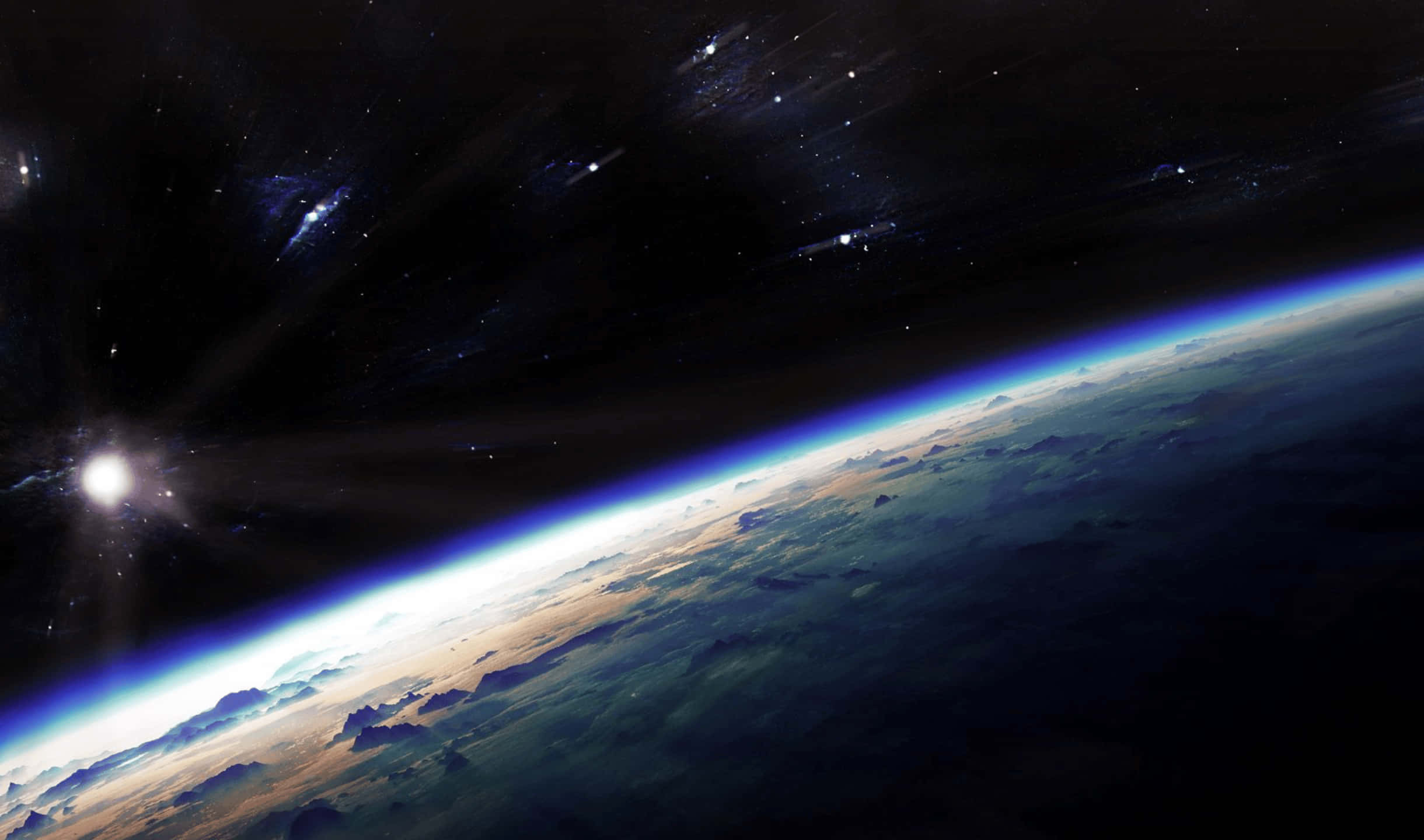2440x1440 地球與太空監視器背景 壁紙 — 從太空俯瞰地球的壯麗景色，散發著藍色光芒的大氣層，以及黑色虛空中閃爍的星星。
