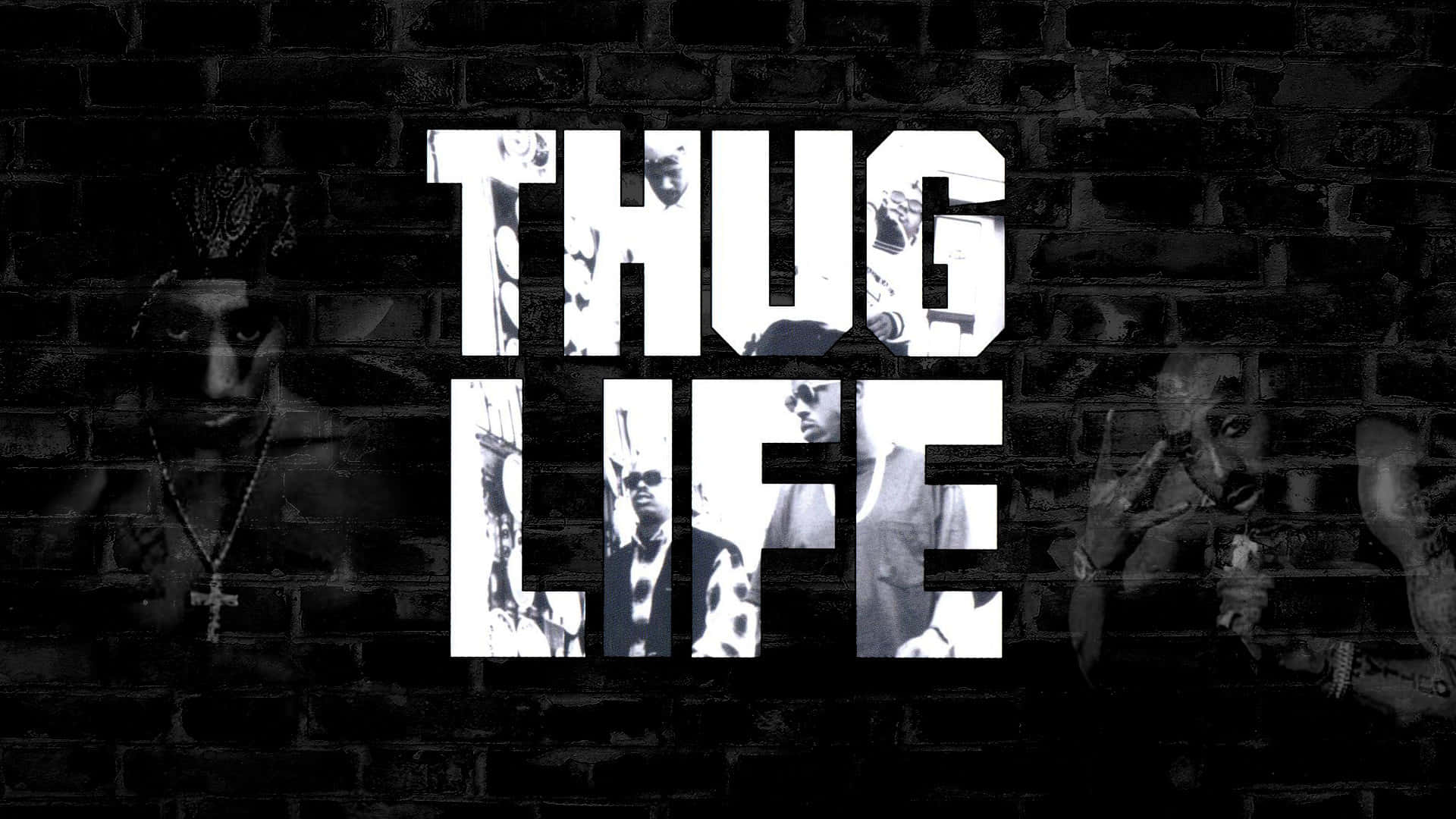 磚牆上帶有 Tupac 肖像的黑白 'THUG LIFE' 文字。