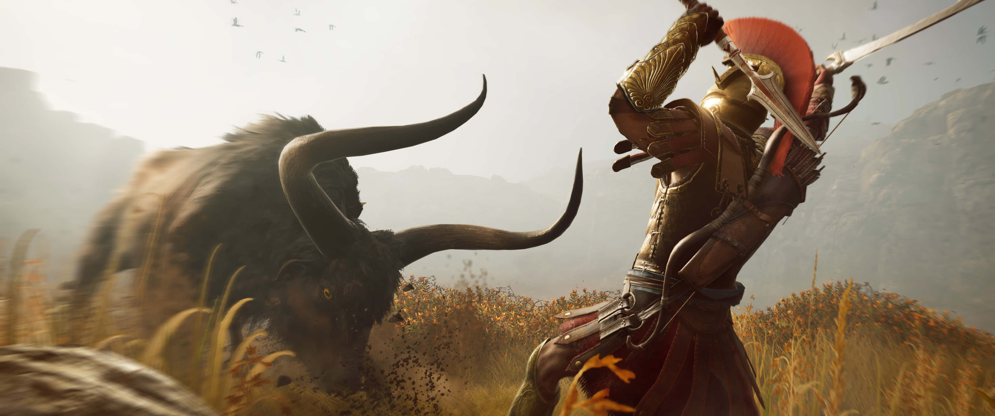 3440x1440p 刺客信條：奧德賽 背景刺客對戰公牛 壁紙 — 一名身穿金色盔甲的戰士在朦朧的日光下，於金色草地上與一頭巨大的公牛交鋒。