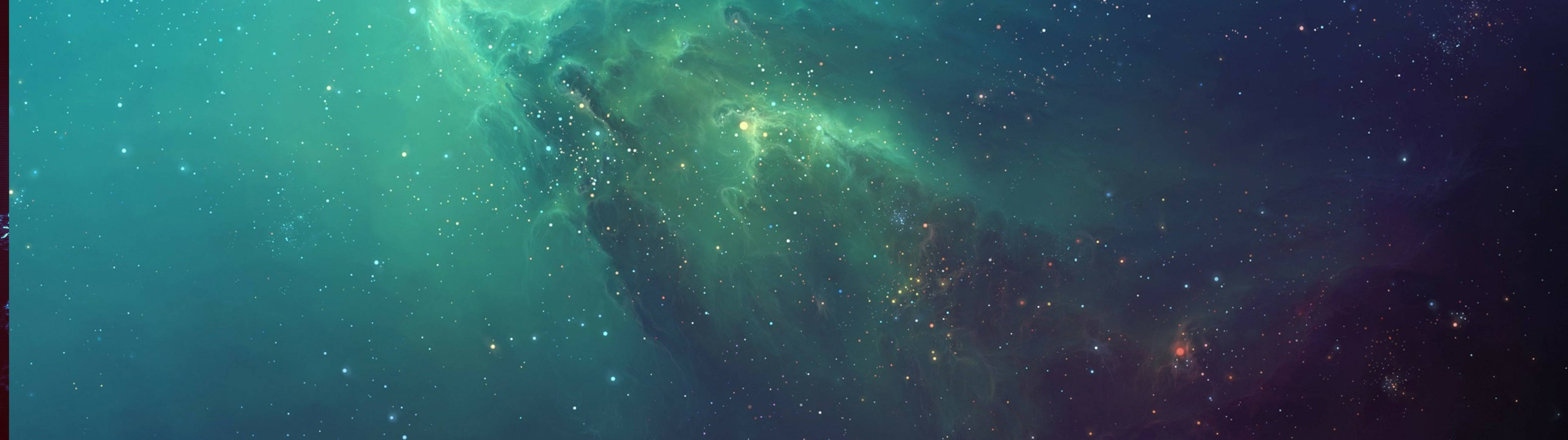 充滿活力的藍綠色和紫色星雲，充滿了深空中的星星。