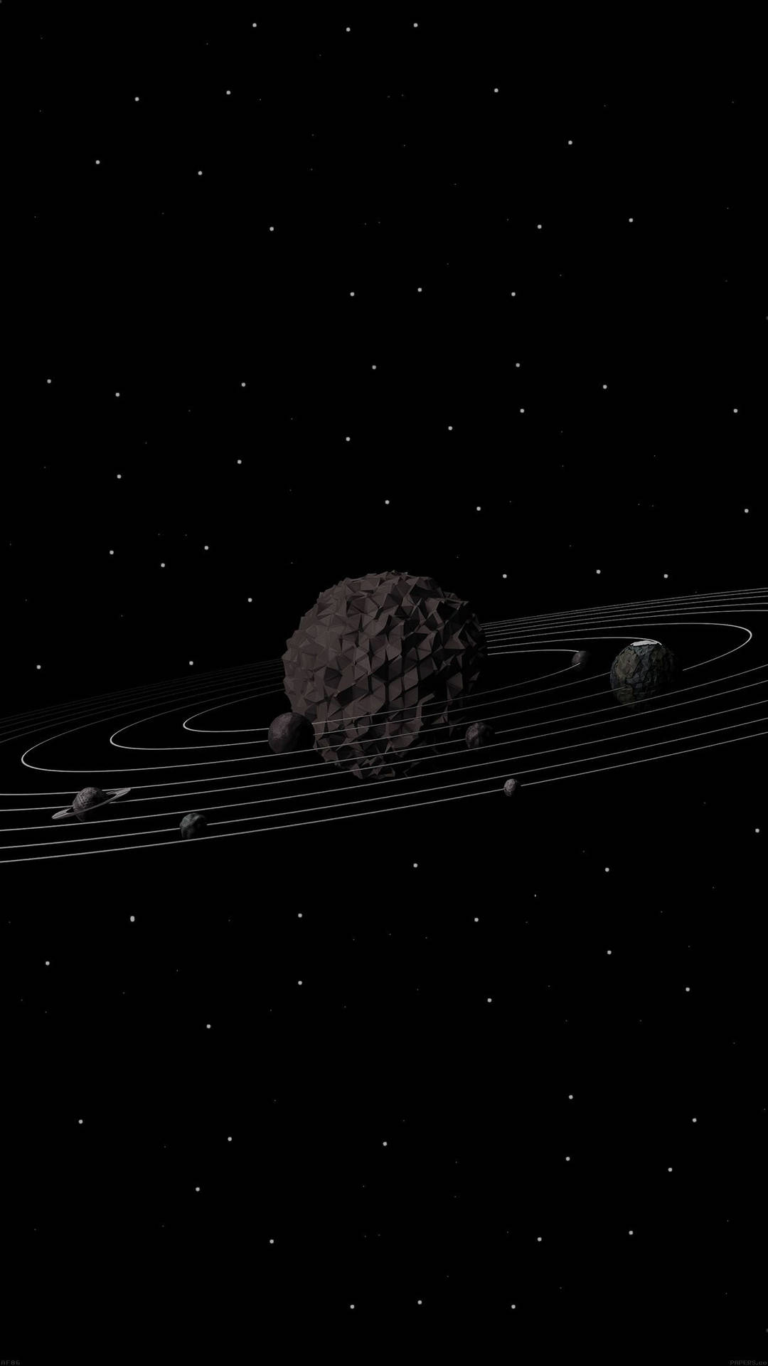 一顆帶有環的黑暗小行星在星場中運行。