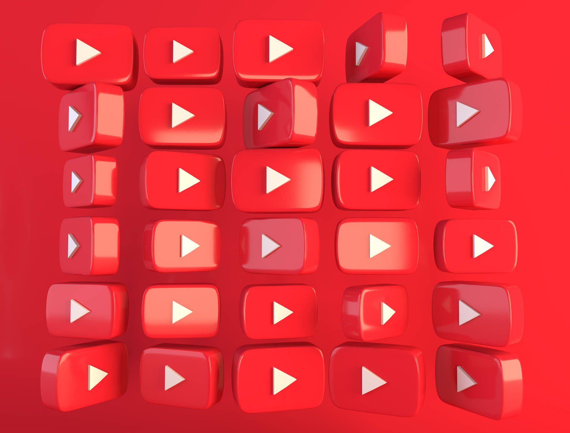 紅色YouTube播放按鈕以3D網格圖案排列。
