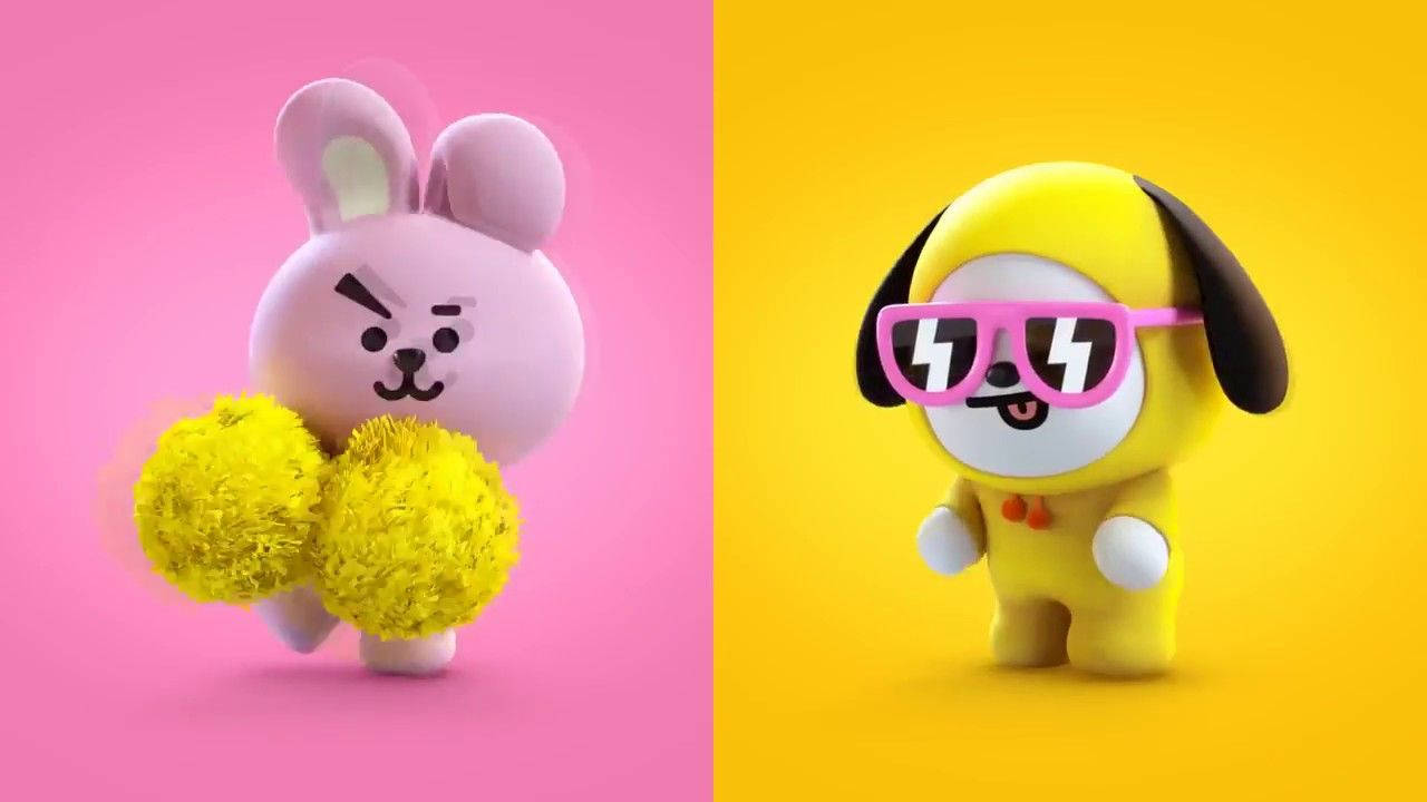 3D 烘焙餅乾與奇米 Bt21 壁紙 — 一隻粉紅色兔子拿著黃色絨球，站在一隻戴著粉紅色太陽眼鏡的黃色狗旁邊，背景是粉紅色和黃色分開的。