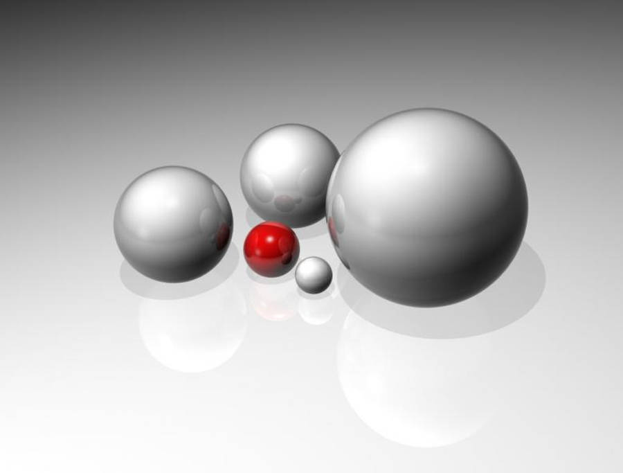 3D 紅白球體 壁紙 — 五個不同大小的金屬球體，其中一個鮮紅色球體位於它們之間，放置在反光表面上。