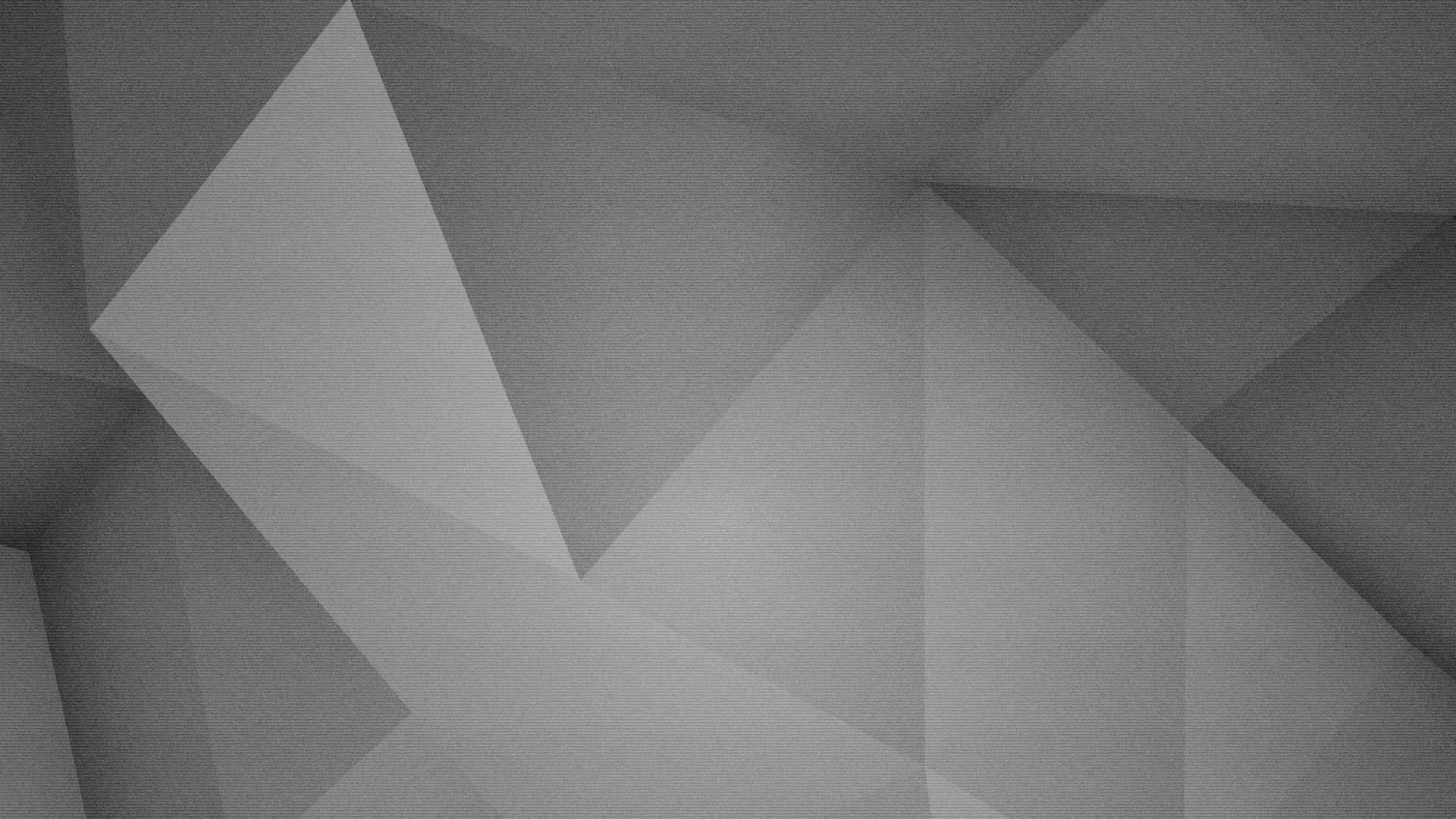 3D多邊形圖案灰底背景 壁紙 — 抽象幾何圖案牆紙，以柔和的灰色三角形切面營造現代簡約質感。