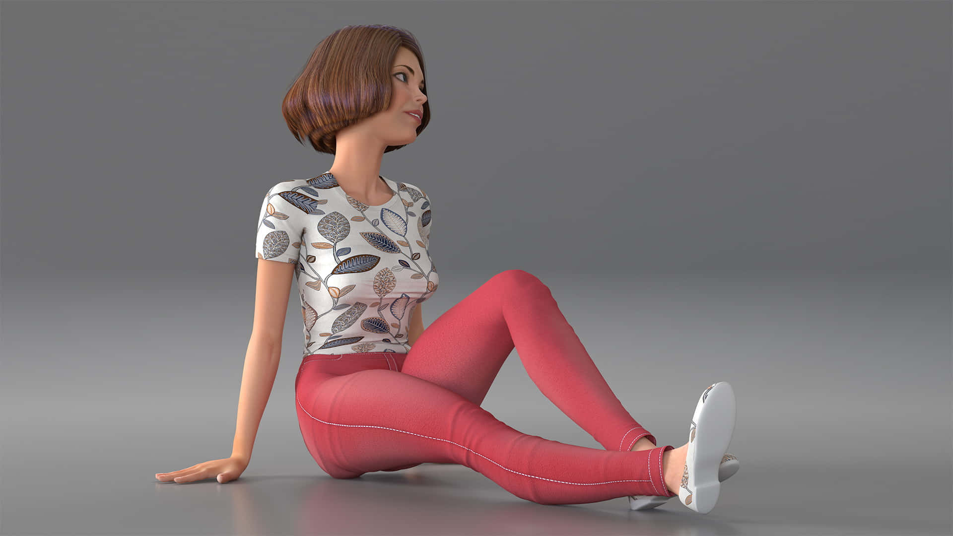 3D女孩坐姿照 壁紙 — 一位3D渲染的短棕髮女性盤腿坐在灰色地板上，穿著圖案上衣和紅色褲子。