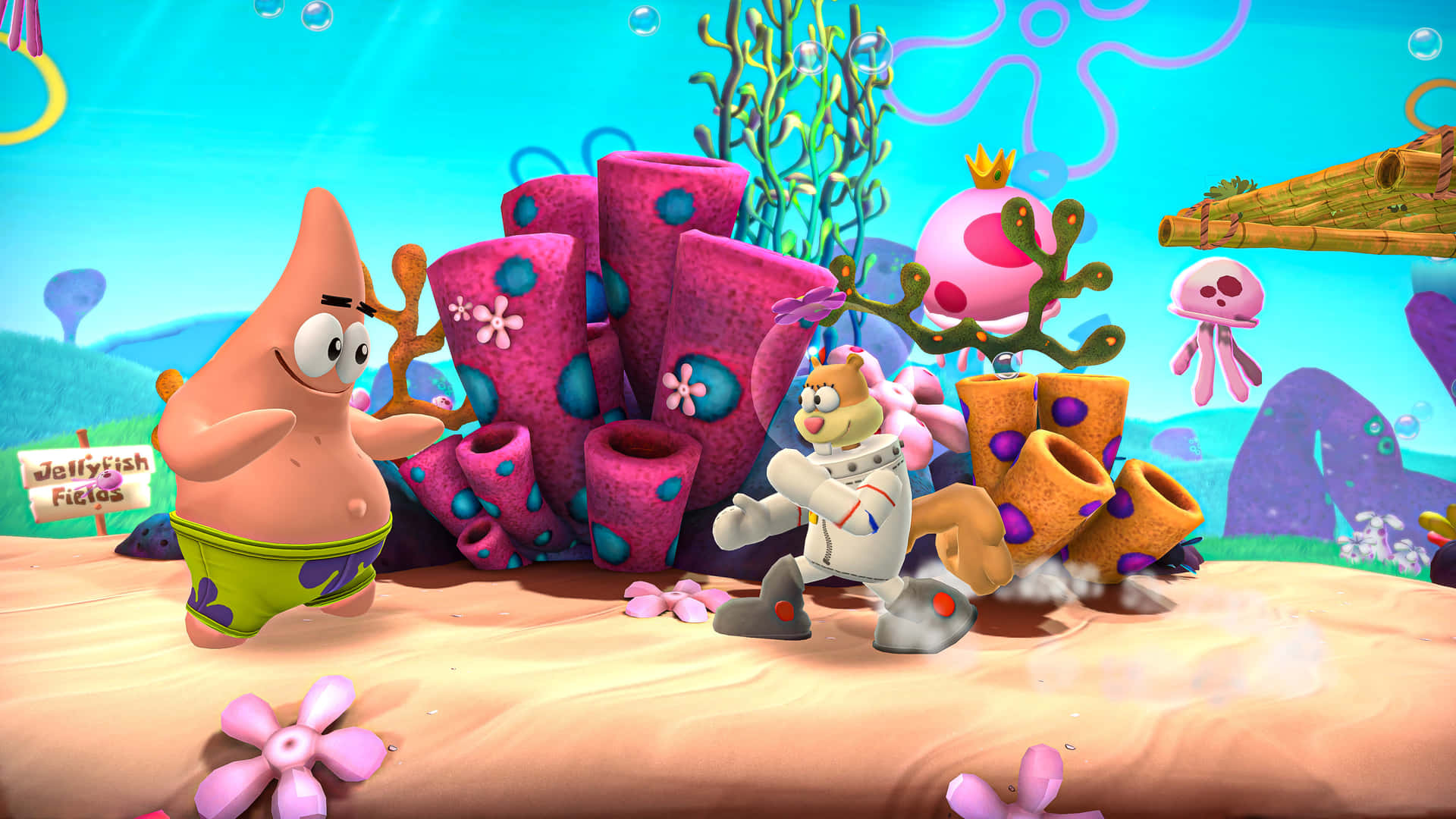 Patrick Star 同 Sandy Cheeks 喺一個色彩繽紛嘅海底水母田。 — 派大星 GIF 壁紙