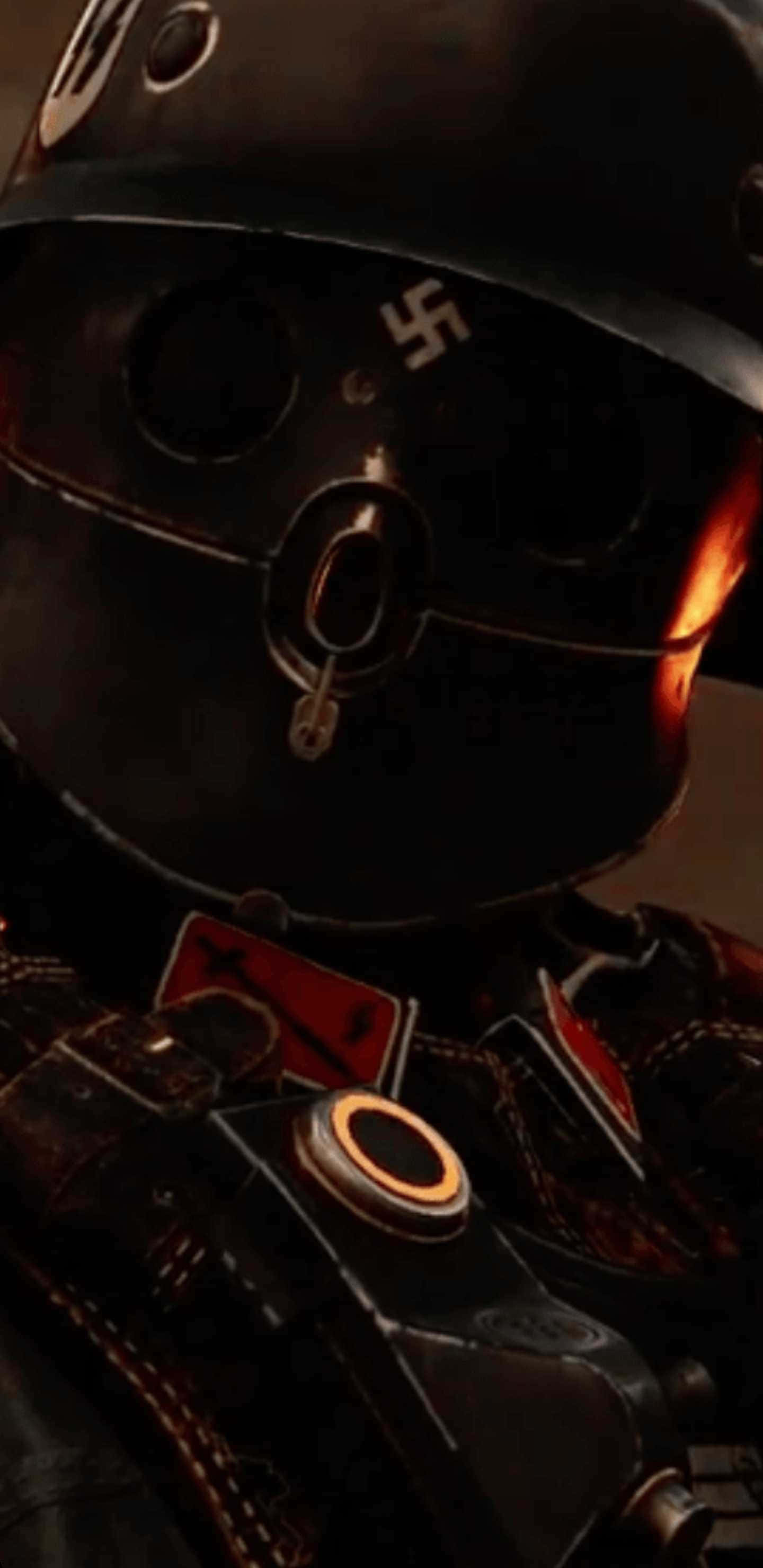 像素3XL《Wolfenstein II》遊戲背景：激烈遊戲畫面 壁紙 — 昏暗光線中，一個戴著深色頭盔、帶有卐字徽章和發光橙色點綴的人物特寫。